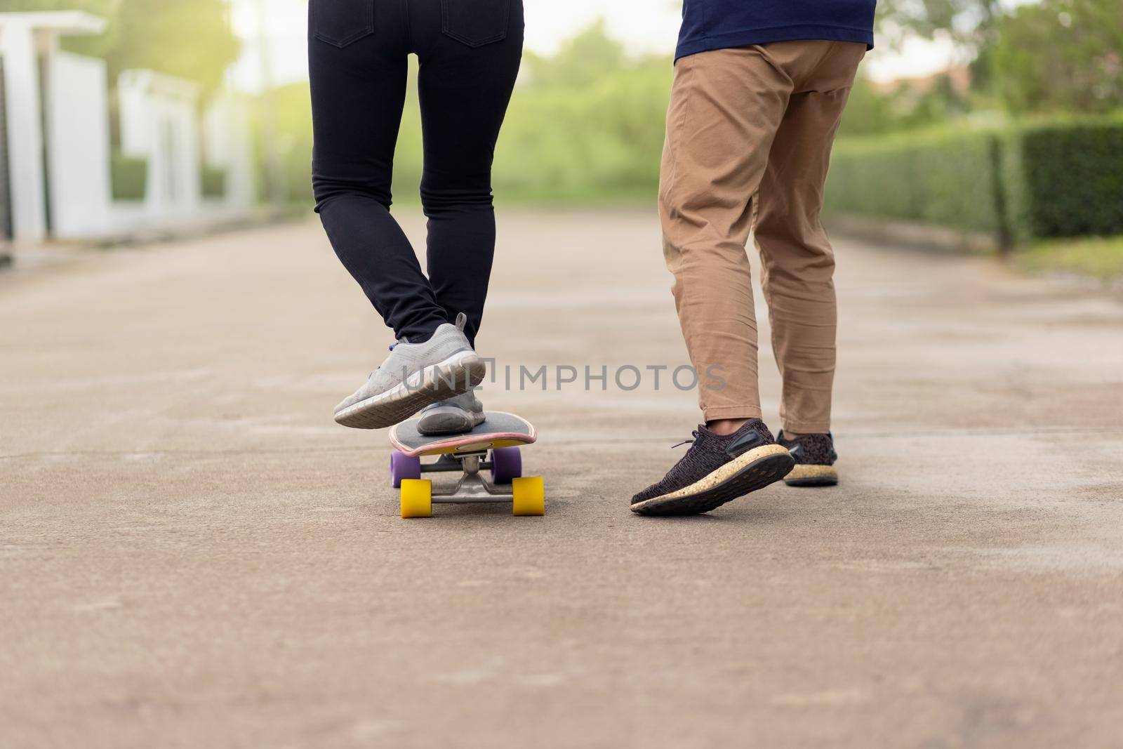 Woman practice on surfskate in park by toa55