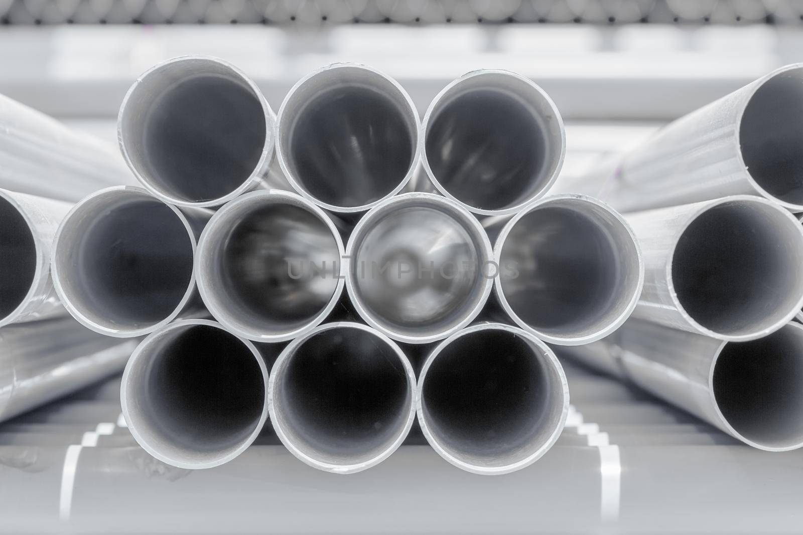 PVC pipes stacked in construction site by toa55