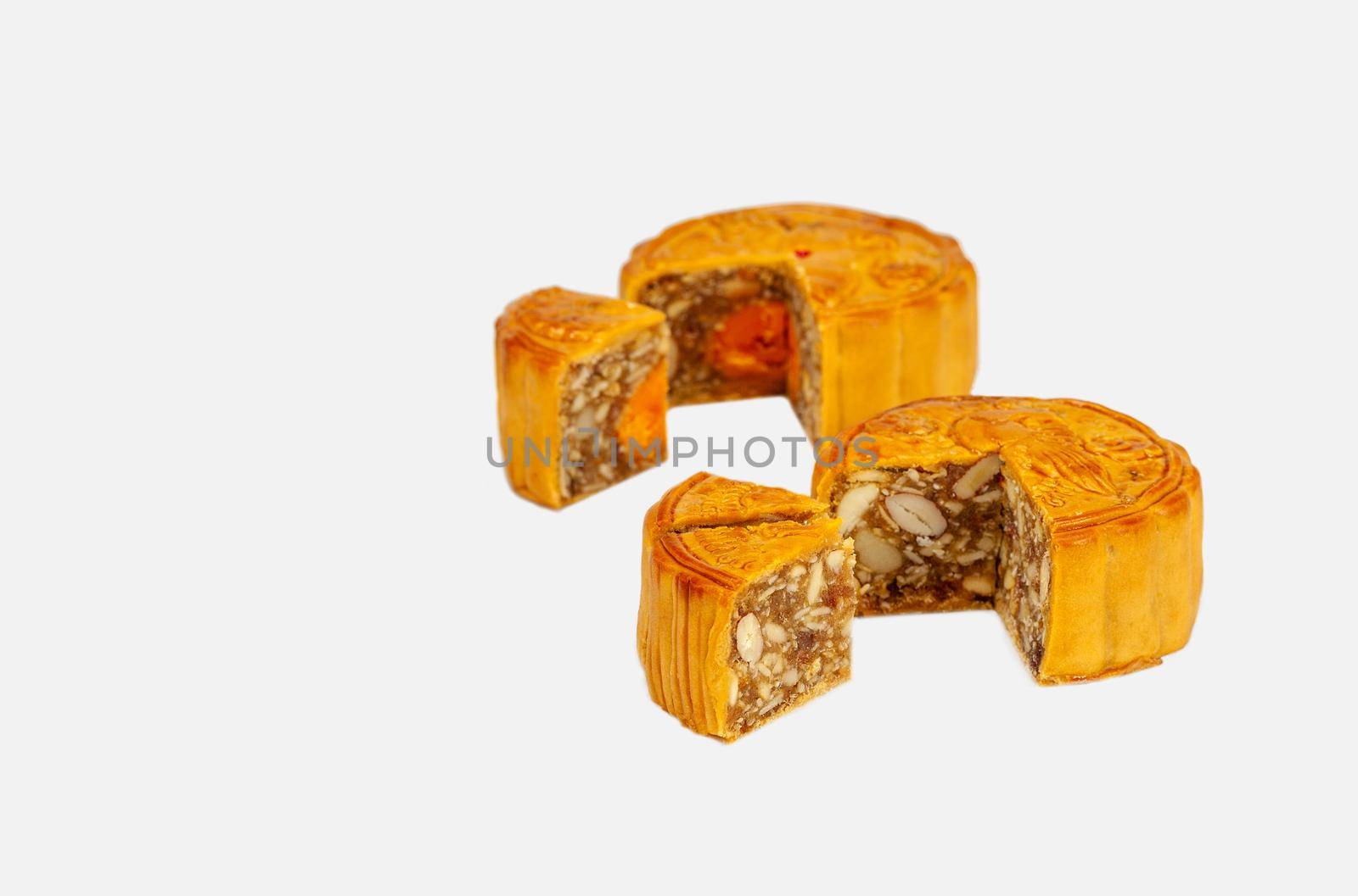 Wuren (Mixed Nuts) and  Salted Egg Yolk filling Mooncake on white background