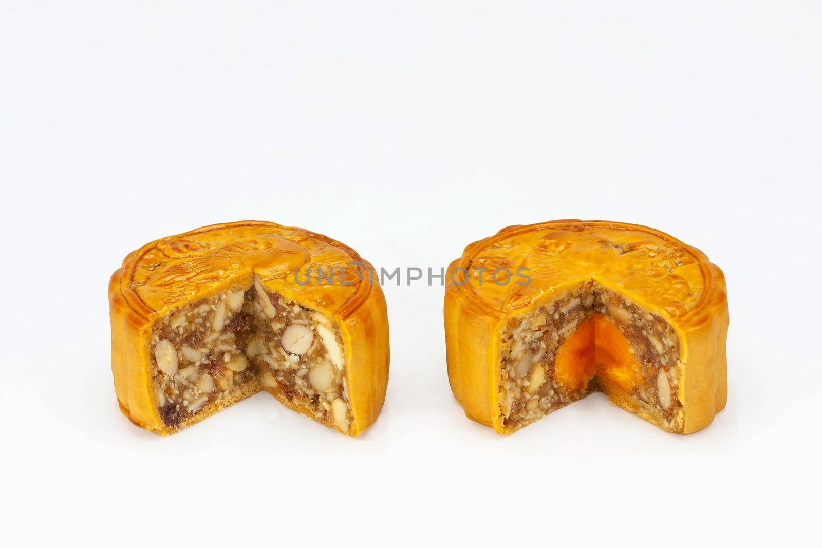 Wuren (Mixed Nuts) and  Salted Egg Yolk filling Mooncake on white background by toa55