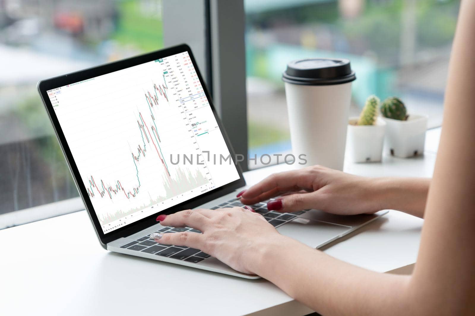 Stock market data chart analysis by ingenious computer software . Investment application display stock market chart on the computer screen and advise trading decision .