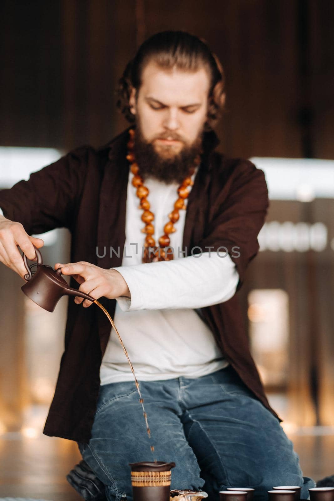 The tea master is preparing to hold a tea ceremony in the interior by Lobachad