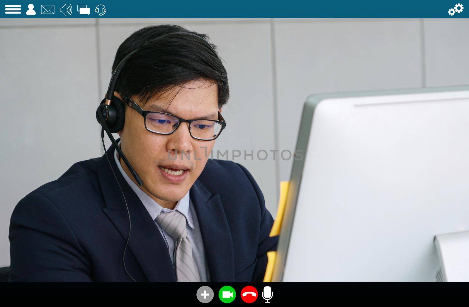 Business people meeting in video conference app on laptop monitor view by biancoblue