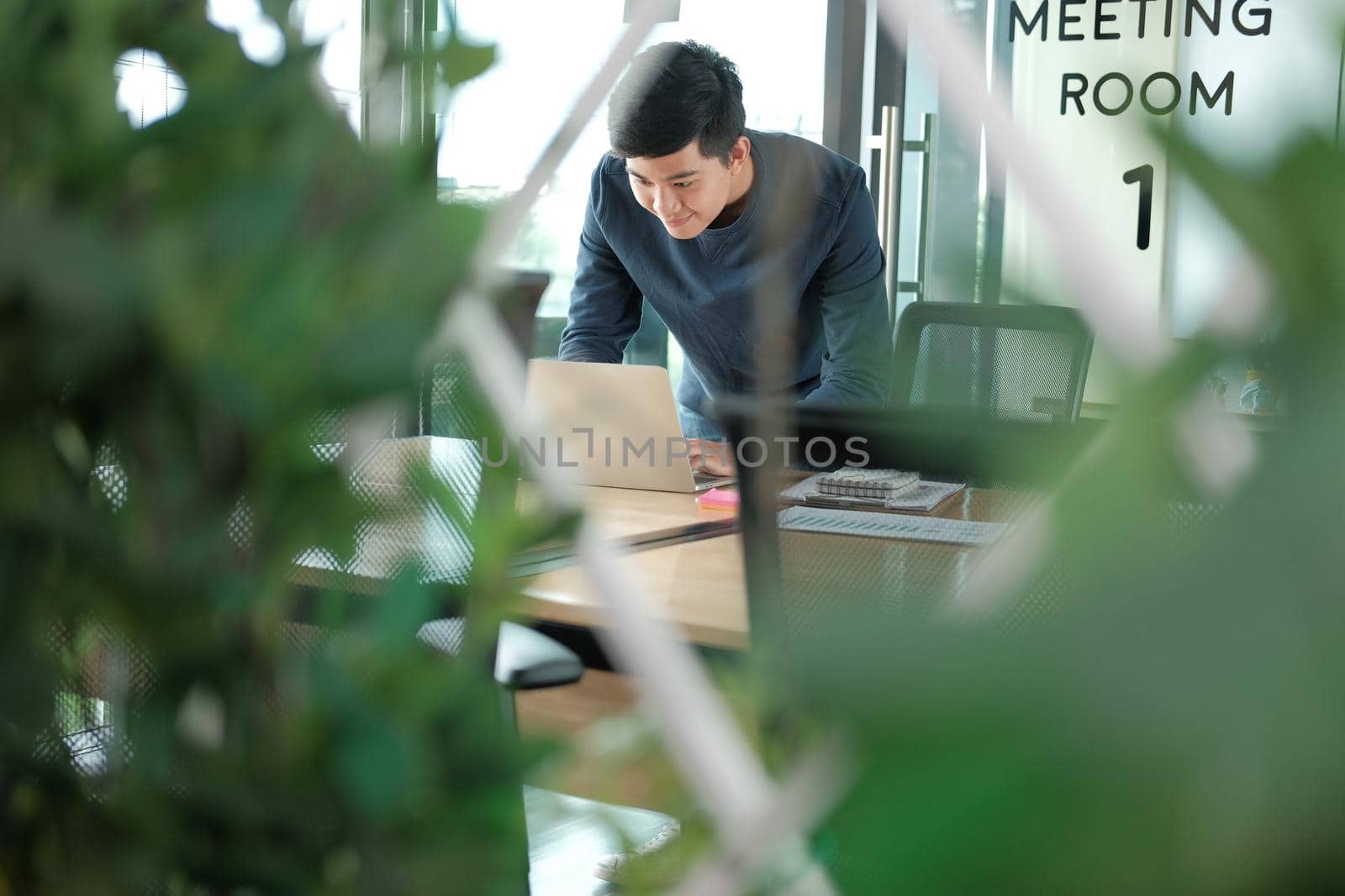 startup male freelancer working with computer at office. man entrepreneur analyzing financial performance at workplace. student studying doing assignment
