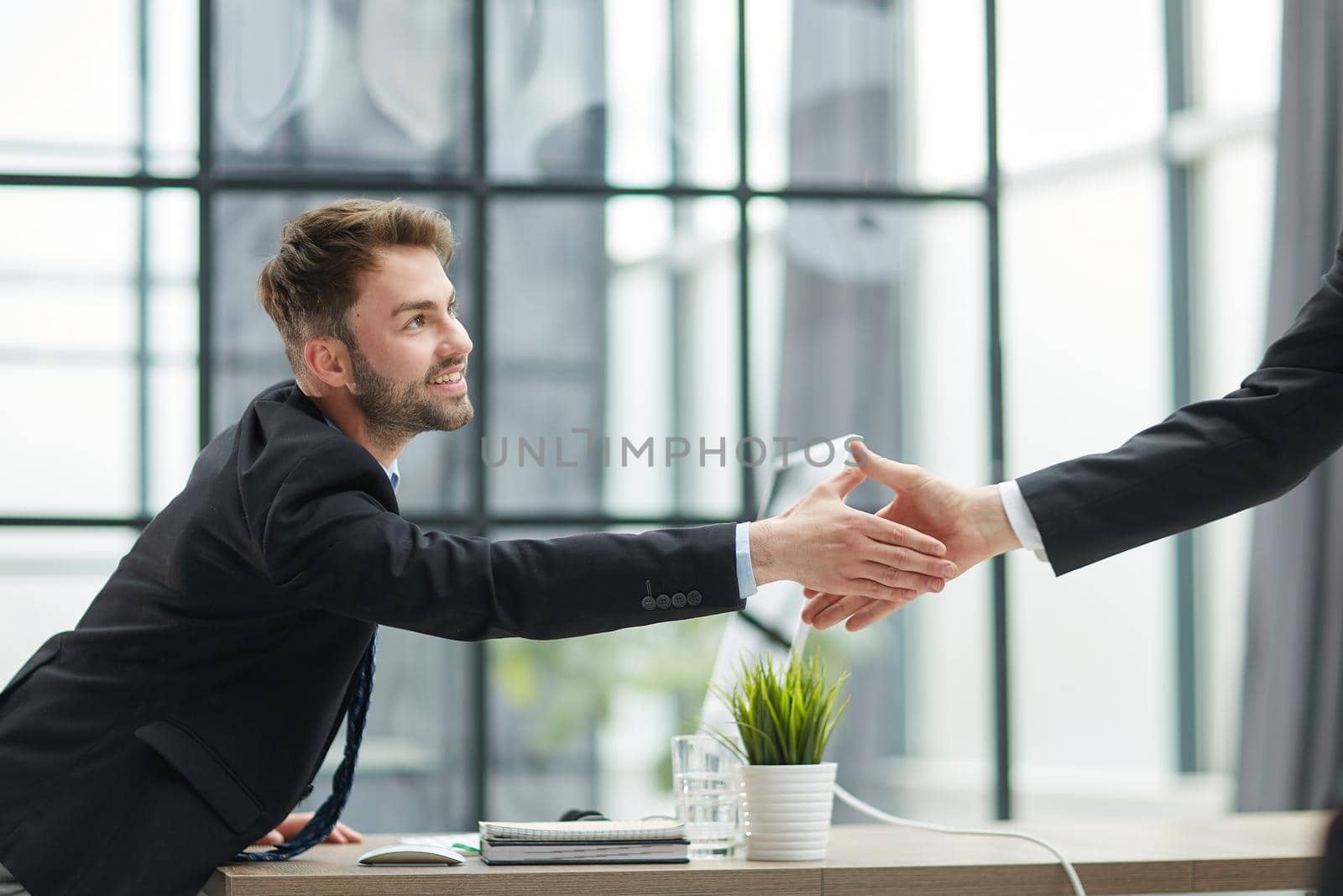 Hello. Portrait Of Cheerful Middle Aged Business Man Waving Hand Smiling