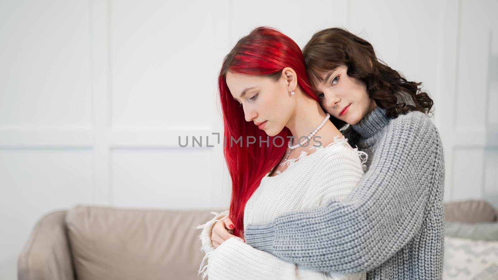 Portrait of young Caucasian women in a relationship. LGBT