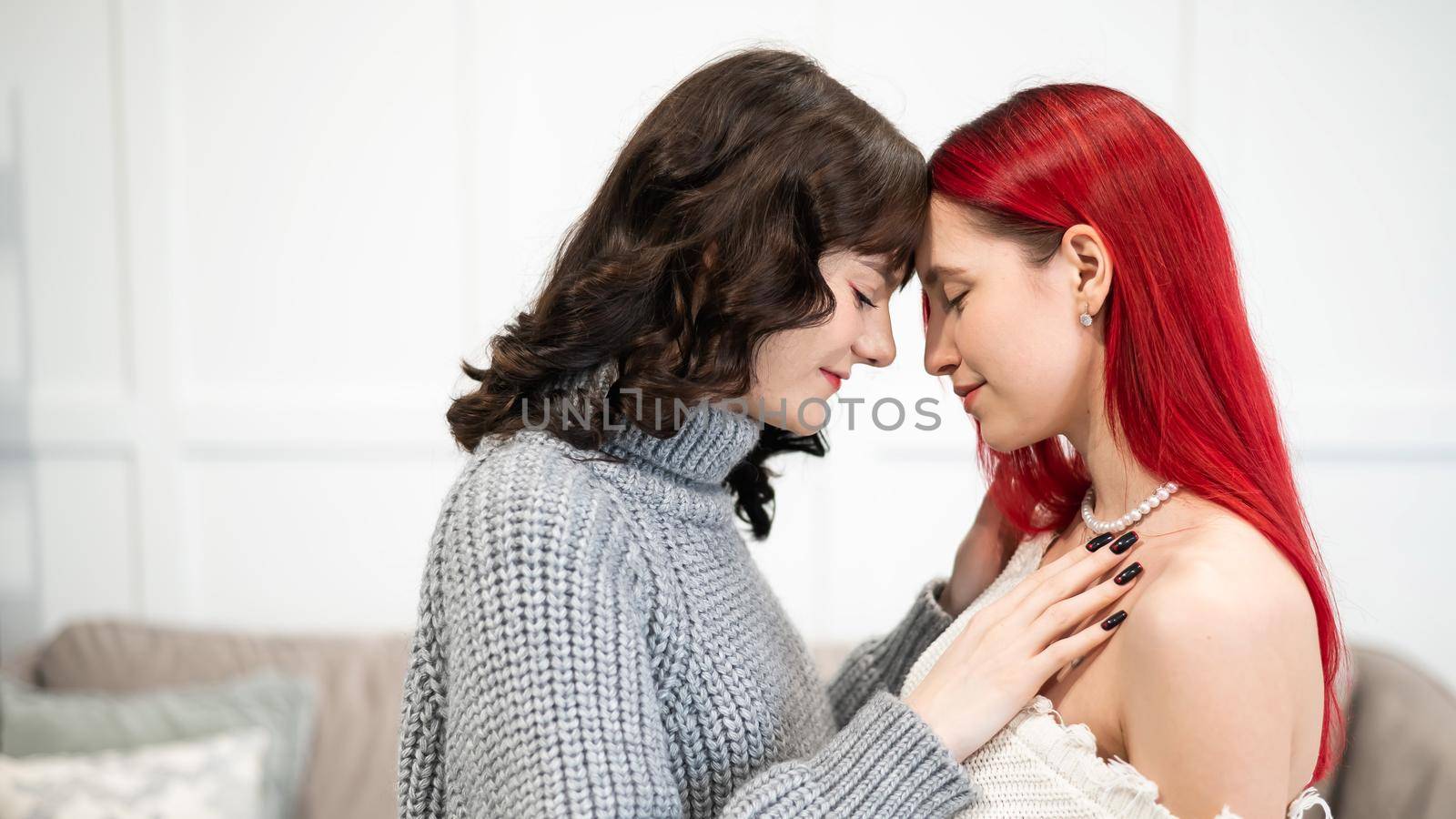 Young Caucasian women hugging tenderly. Same-sex relationships