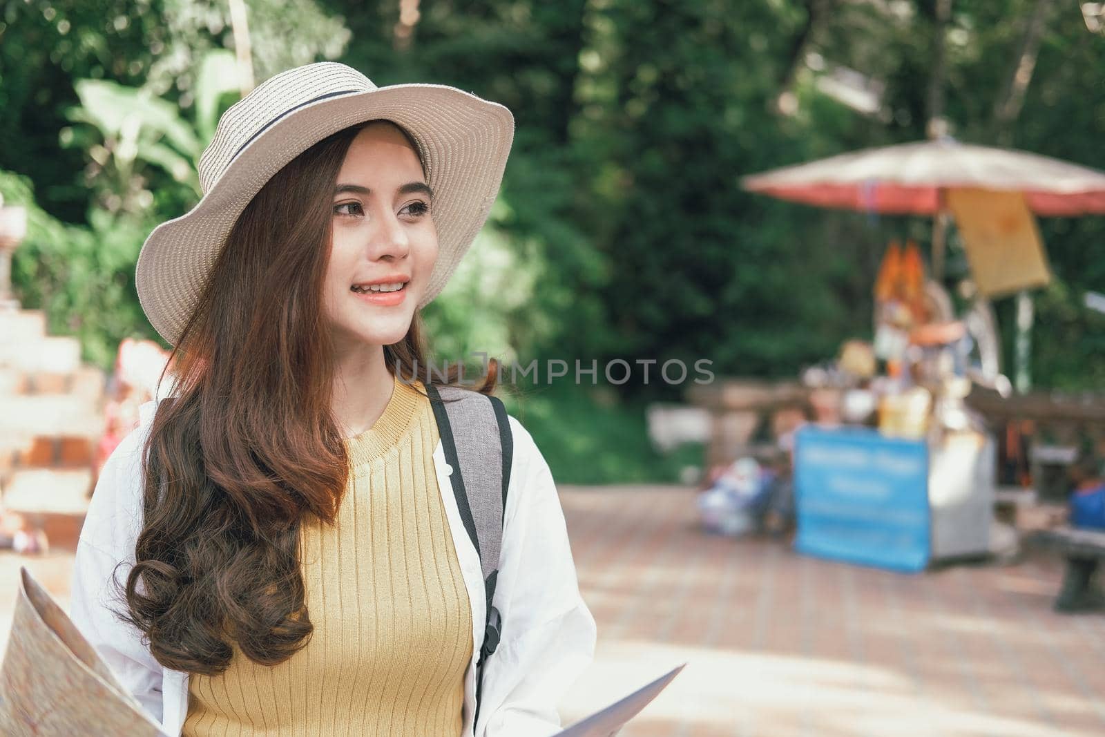 young asian woman traveler tourist with map. journey trip travel concept