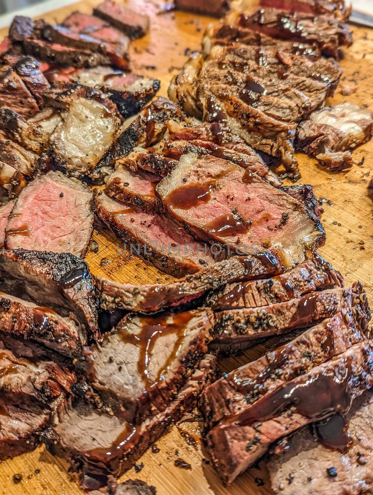 cooked and sliced to perfection 30 day dry aged ny strip beef and bison ribeye by digidreamgrafix