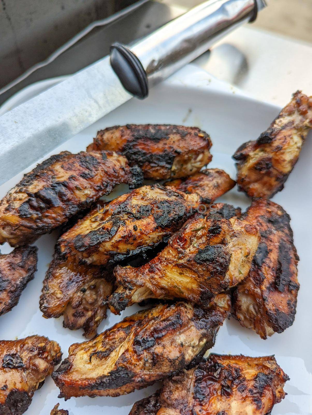 bourbon and brown sugar marinated wings in blackened seasoning by digidreamgrafix