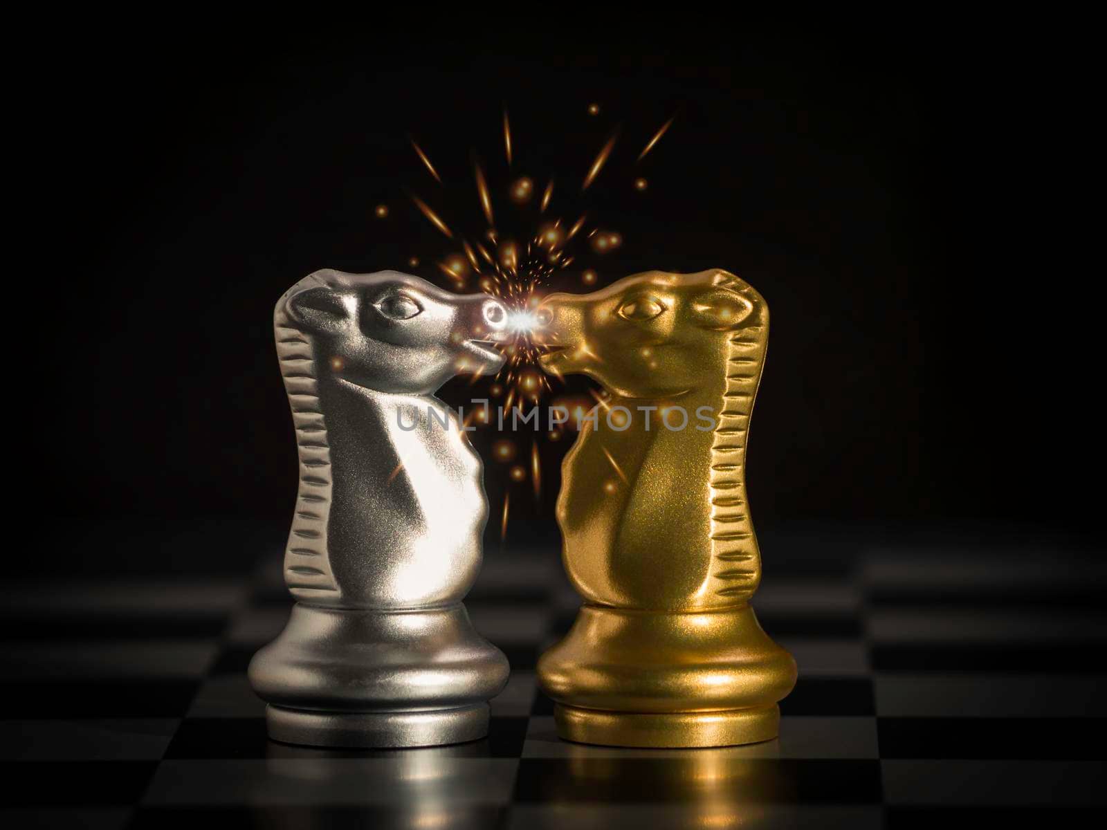 Gold knight chess facing silver knight chess with red hot flying sparks fire on chess board. Business leader market target strategy. business competition success, strategy ideas. by Chakreeyarut