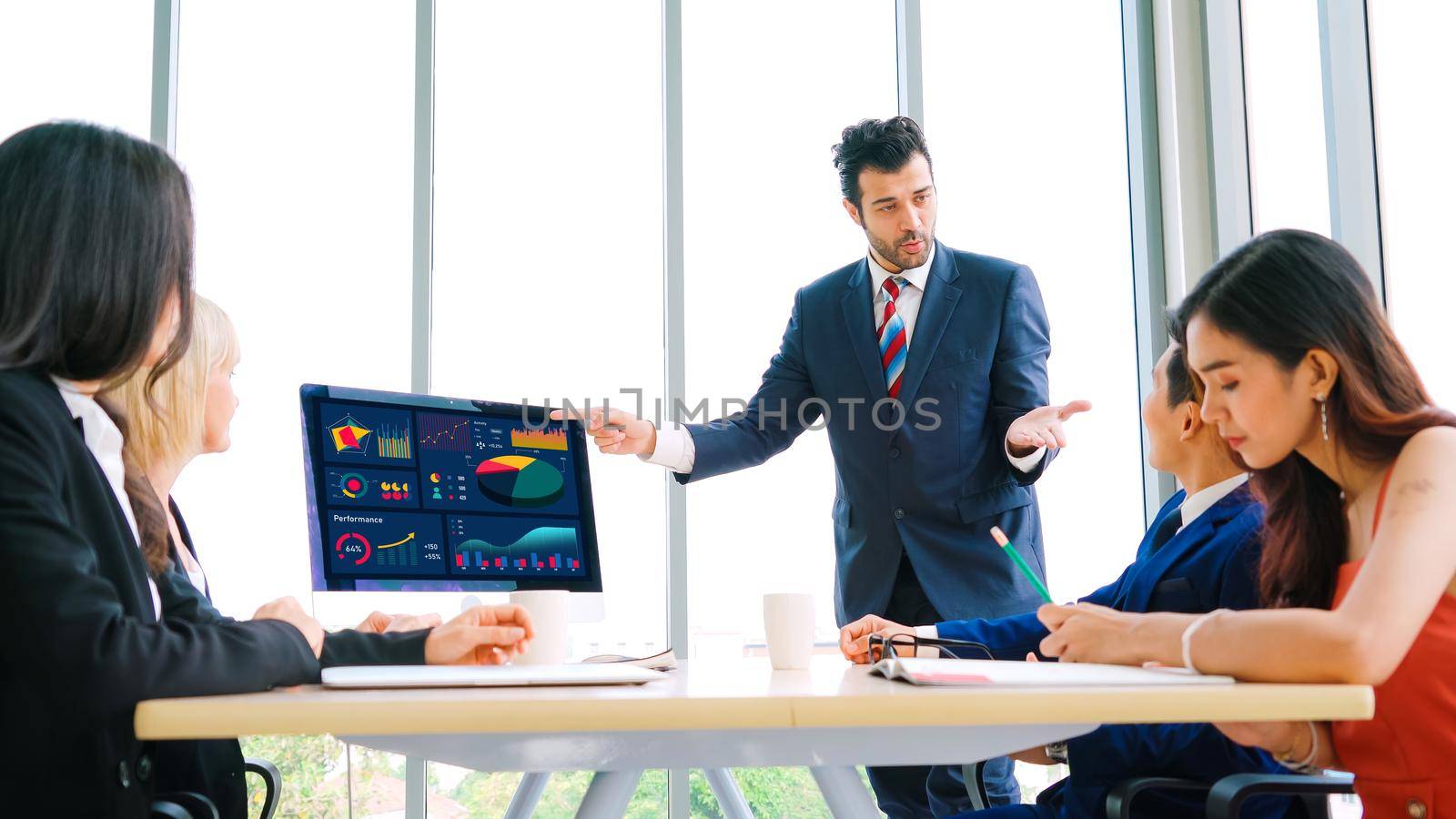 Business data dashboard analysis by ingenious computer software . Investment application display business sales and profit on the computer screen and advise marketing planning decision .