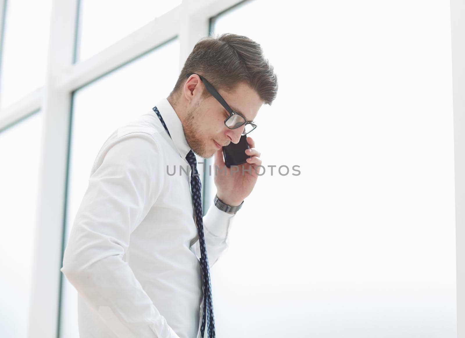 bearded man talking on phone and smiling