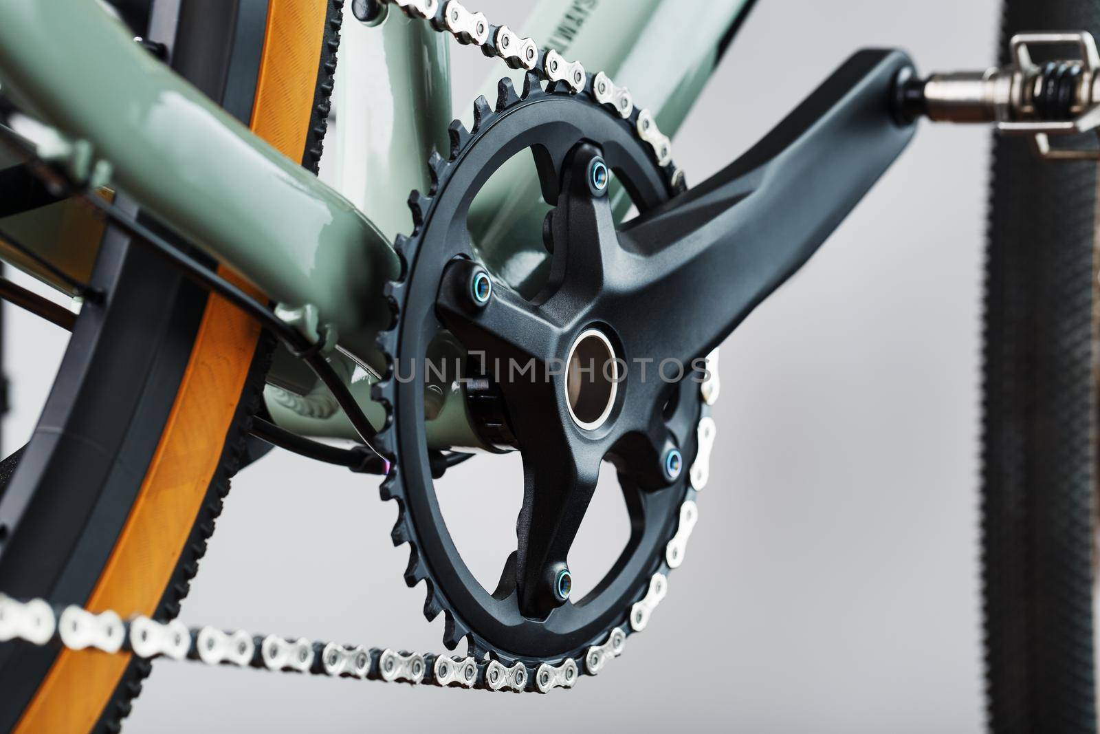 The leading star of a bicycle with a connecting rod and a chain close-up by AlexGrec