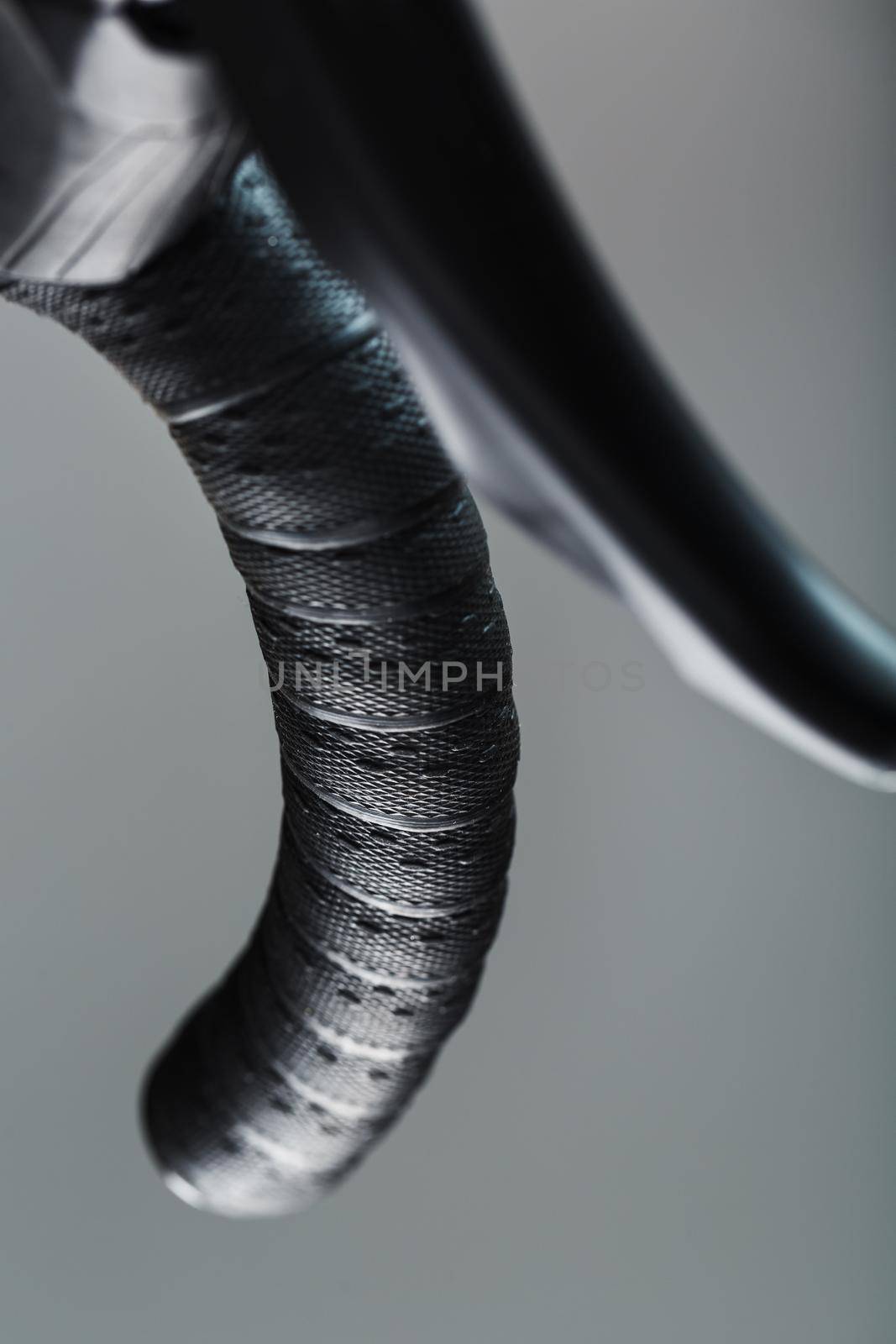 Handlebar winding of a road bike close-up by AlexGrec