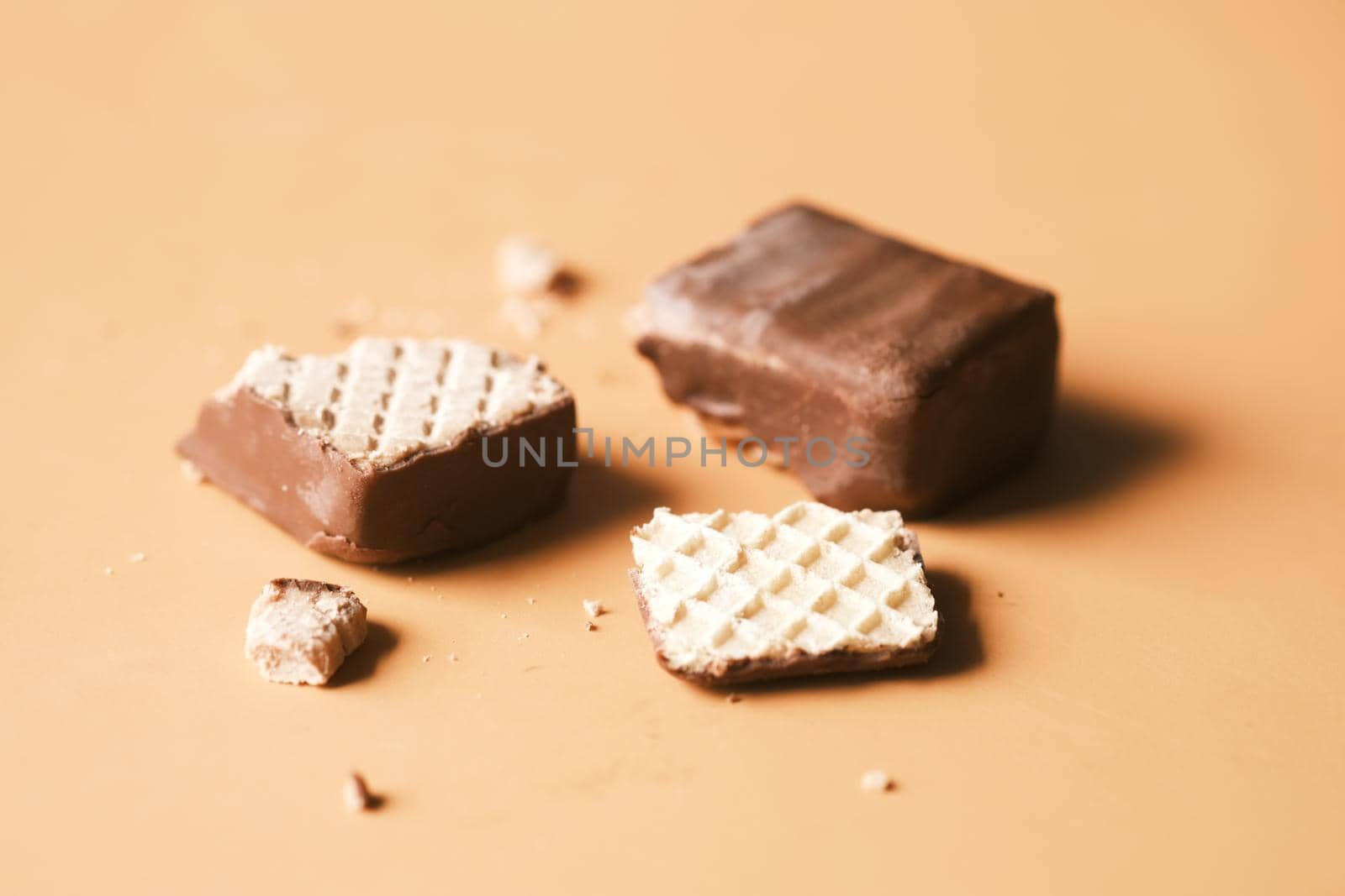 dark chocolate on a plate on table close up .
