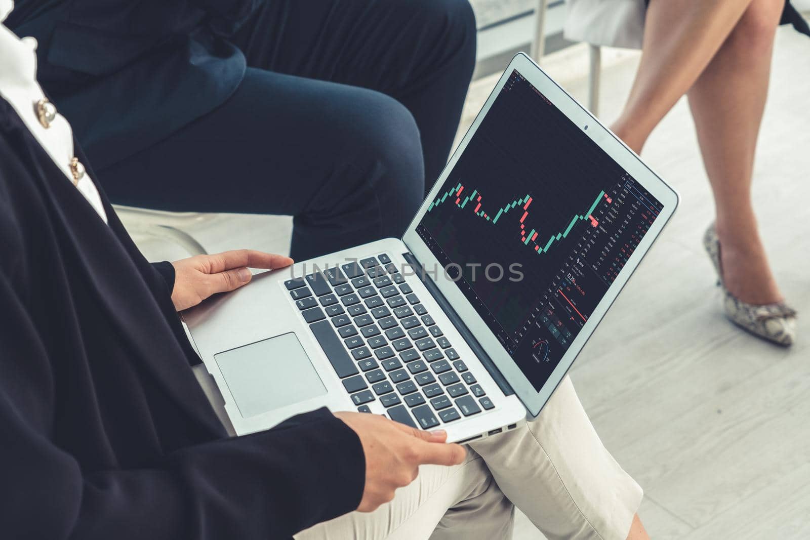 Stock market data chart analysis by ingenious computer software . Investment application display stock market chart on the computer screen and advise trading decision .