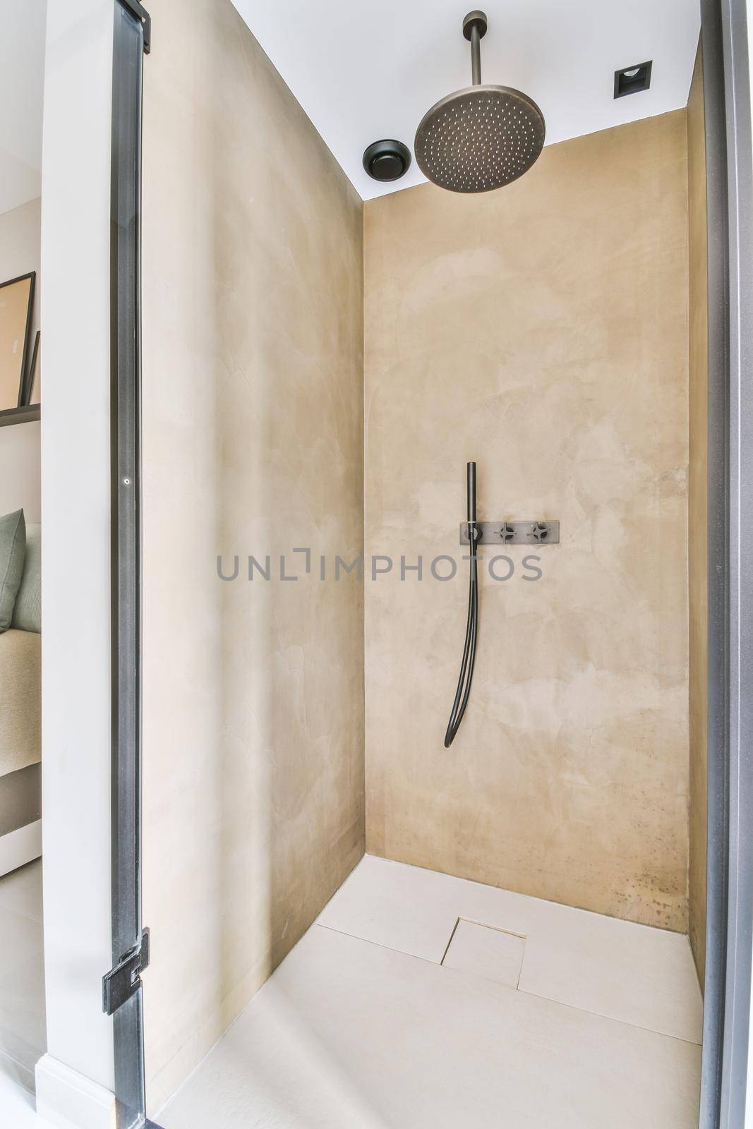 Modern shower stall in a bright bathroom