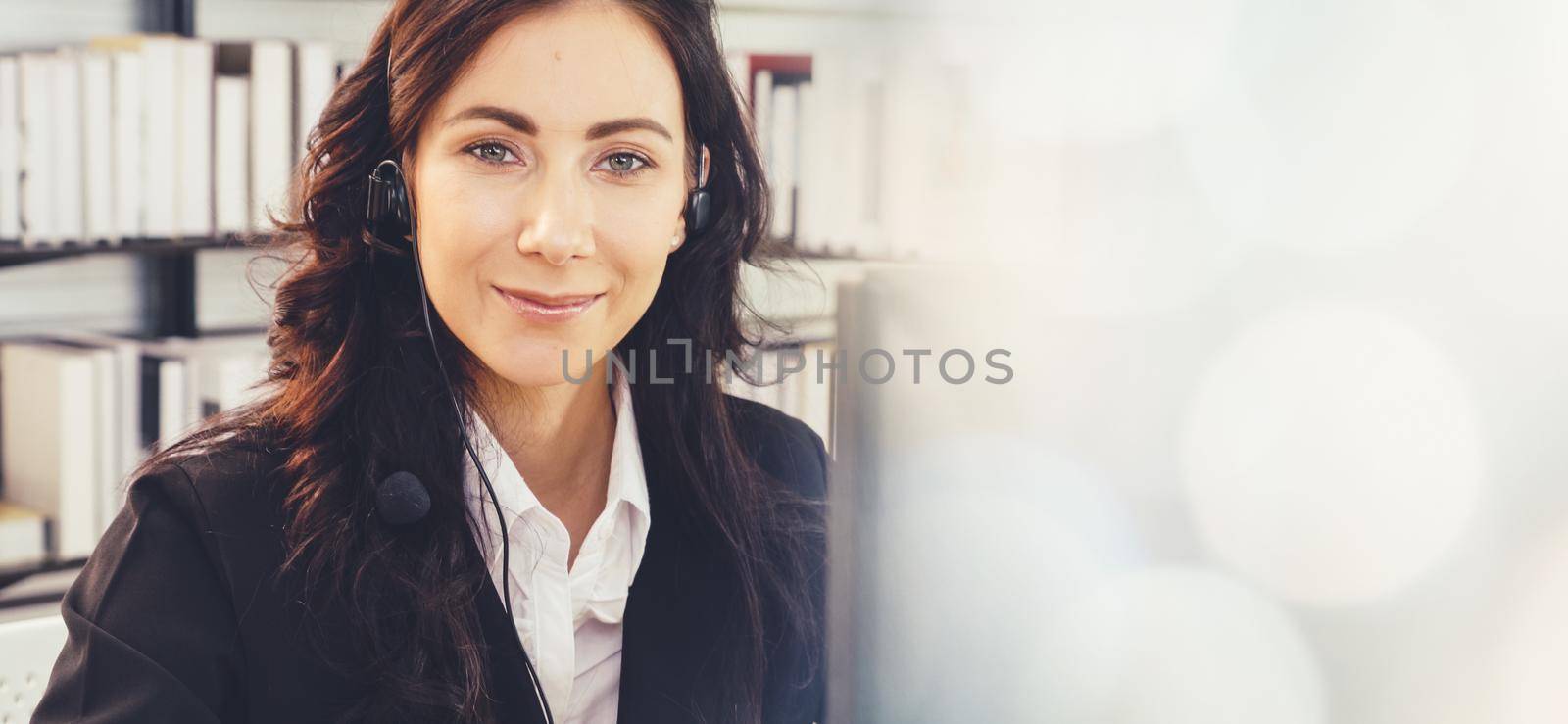 Business people wearing headset working in office broaden view by biancoblue