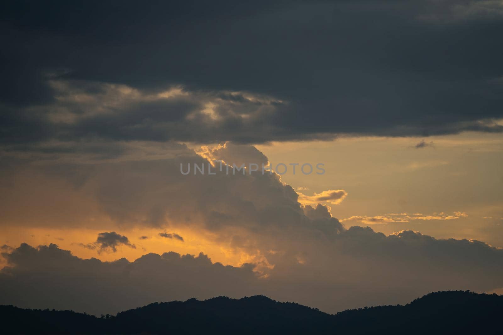 colorful sunset sky and clouds evening on mountain. Sky and clouds natural sunset orange sunbeam light backgrounds nature by Wmpix