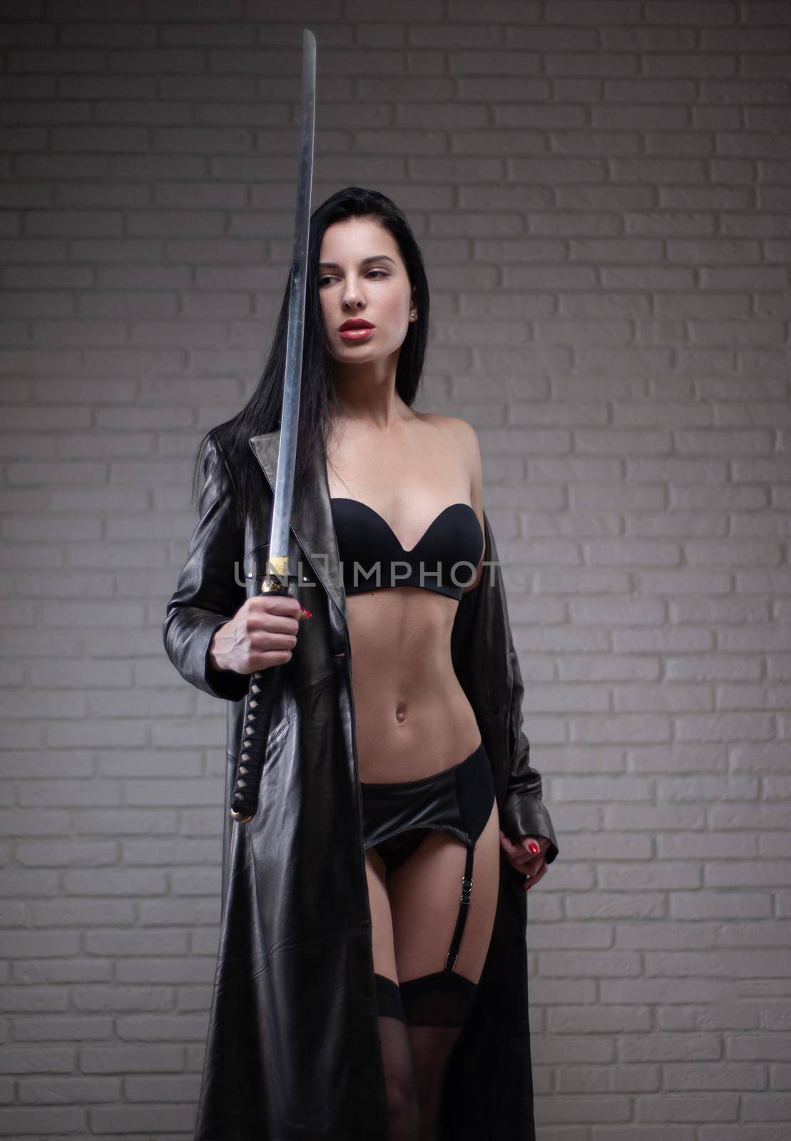sexy girl in a black leather raincoat with a katana in underwear and stockings by Rotozey