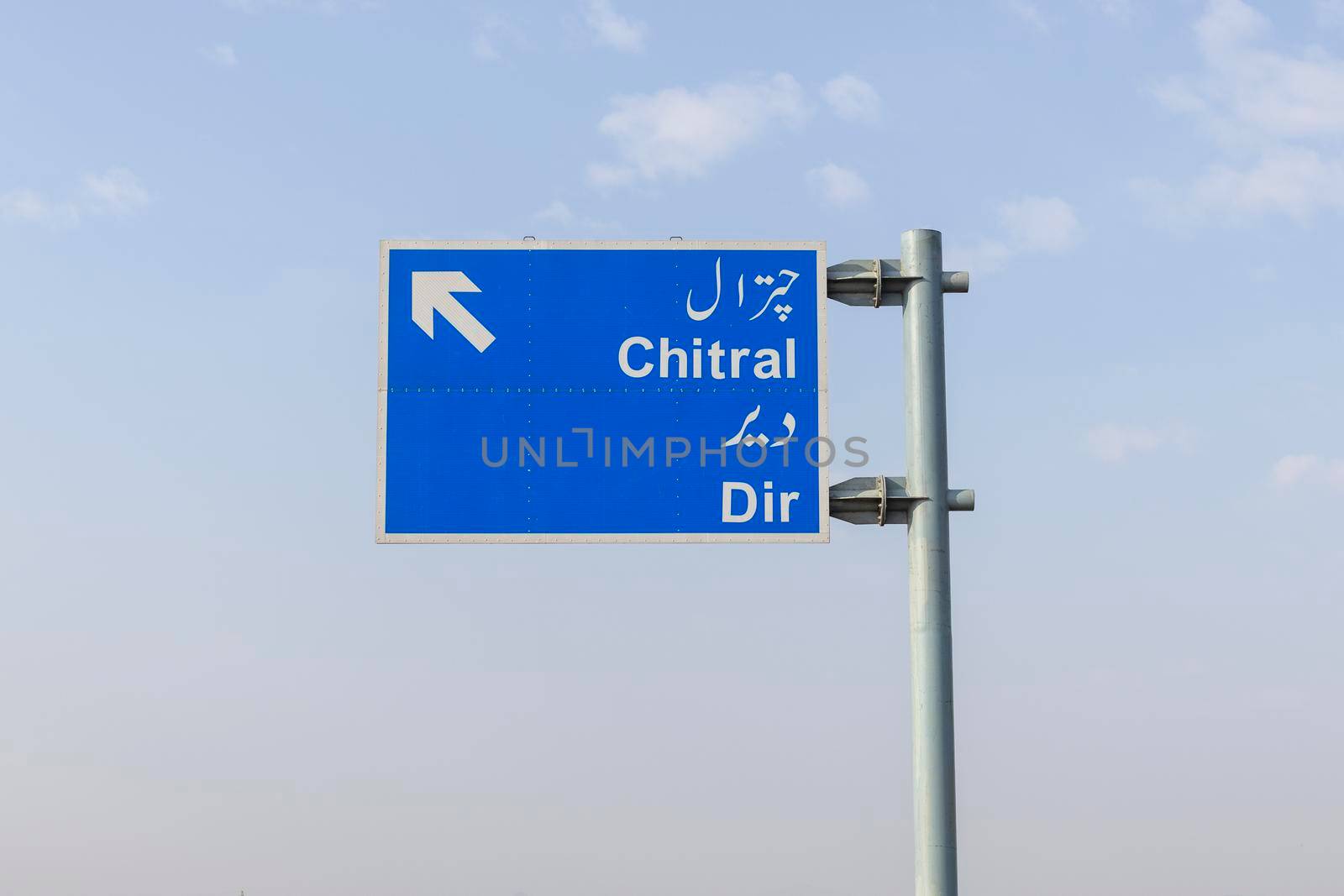 Dir, KPK, Pakistan - March, 7, 2022: Pakistan highway with signs to Dir and Chitral
