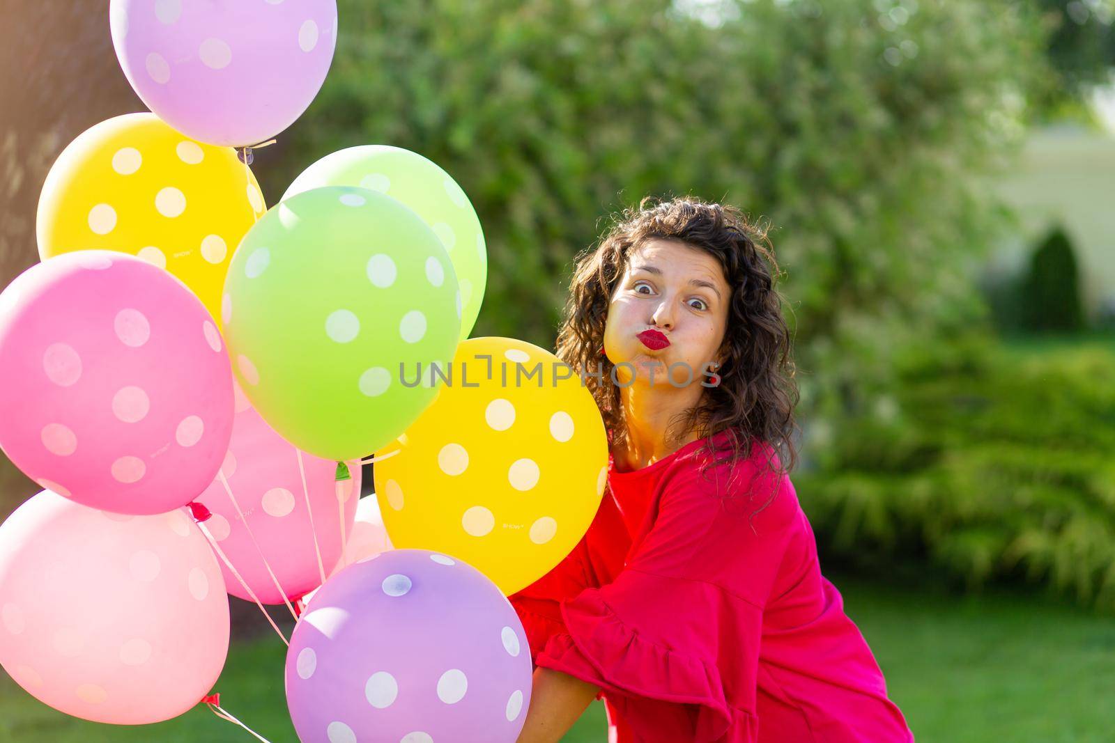 Young bright joyful brunette girl with colorful balloons. Happy lifestyle by Try_my_best