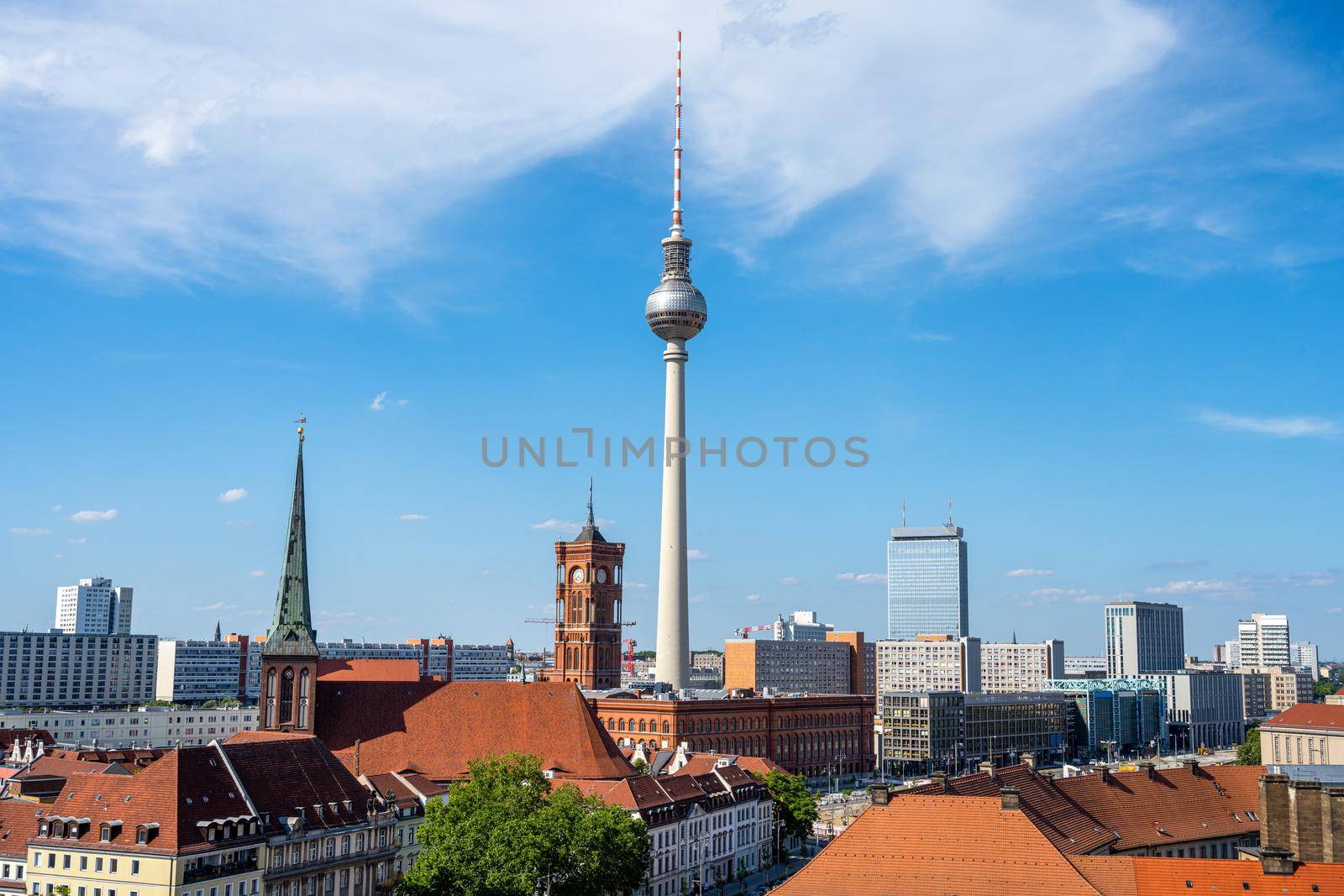 The famous TV Tower of Berlin with the town hall by elxeneize