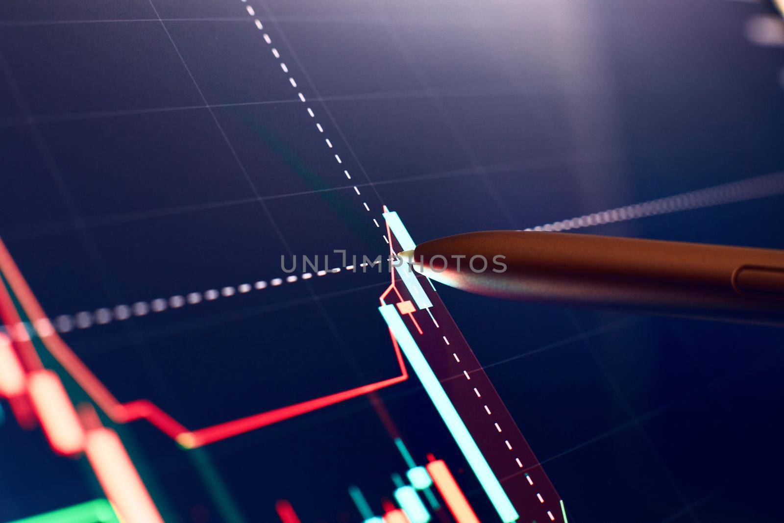 Financial chart with pen, stock analysis data for business background on digital screen. Graphs of the growth of the financial market forex. trading candlestick chart