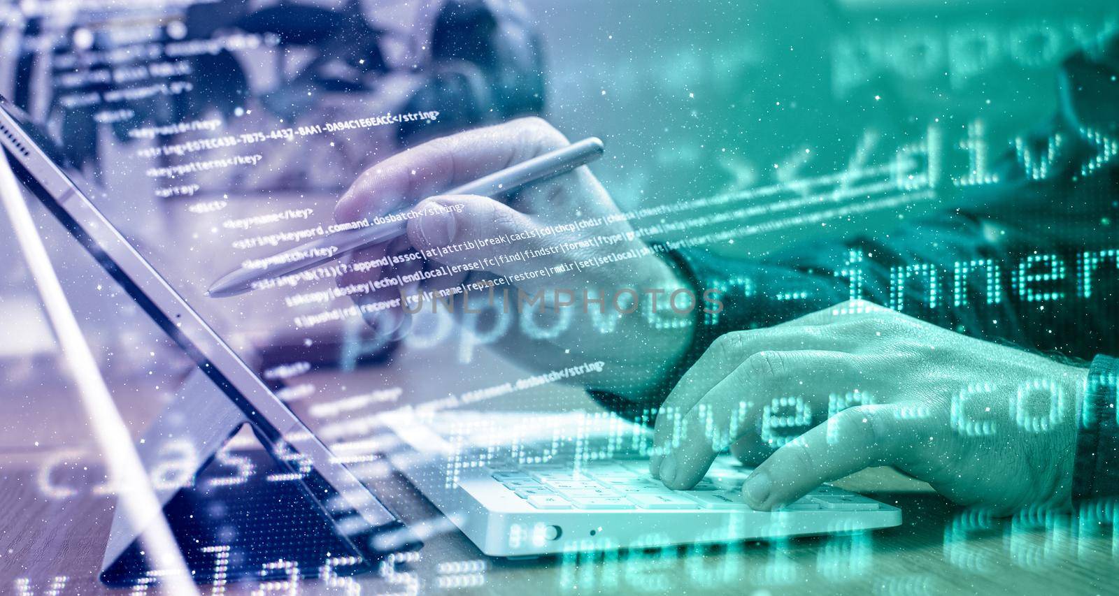 Businessman working with laptop computer on wooden desk in modern office . Programmers and cyber security technologies design.