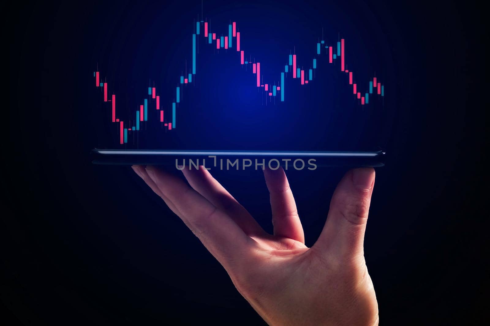 Stock market, Business growth, progress or success concept. Hand of Businessman or trader is showing a growing virtual hologram stock on smartphone