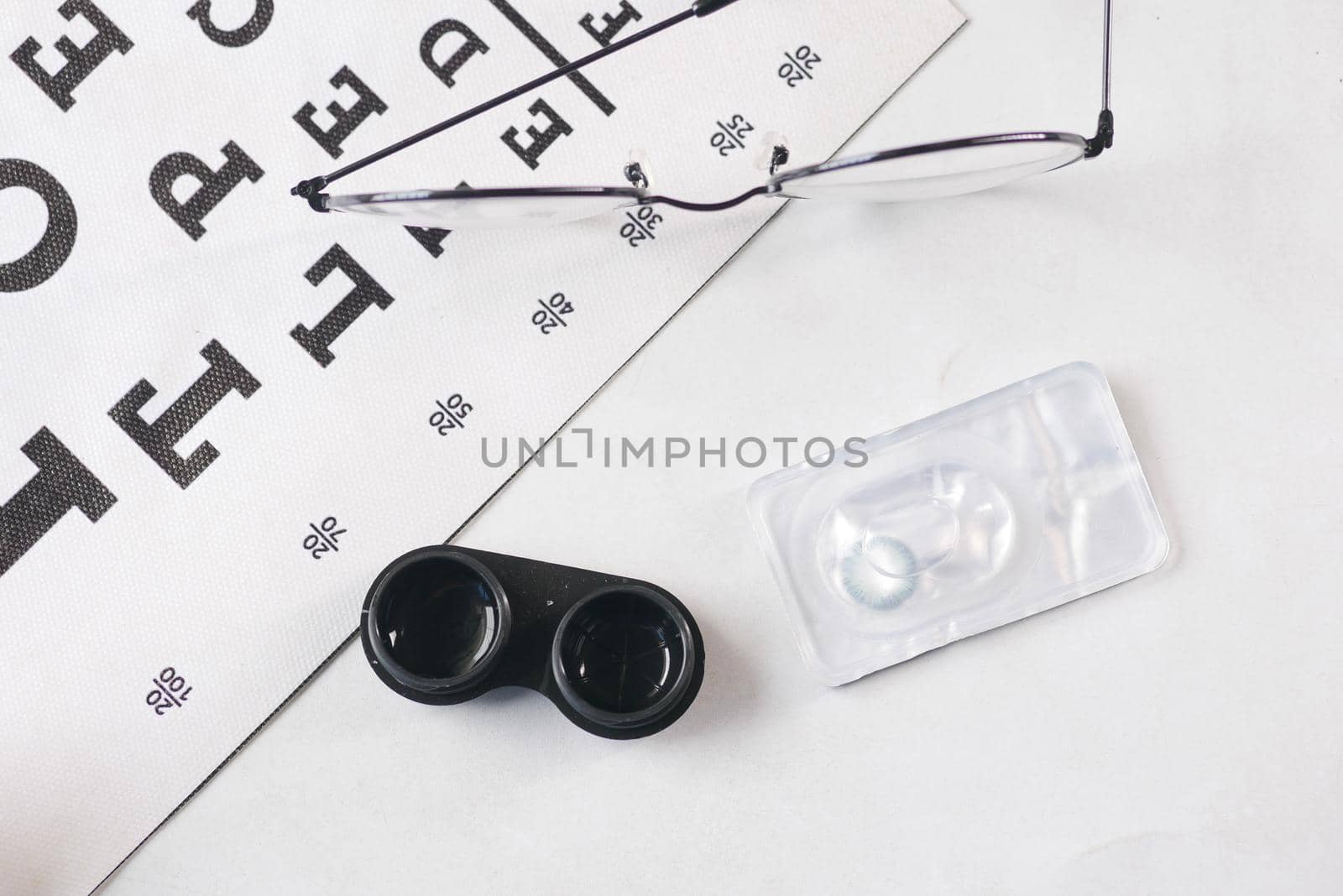 Ophthalmologist accessories glasses with a test target for vision correction.