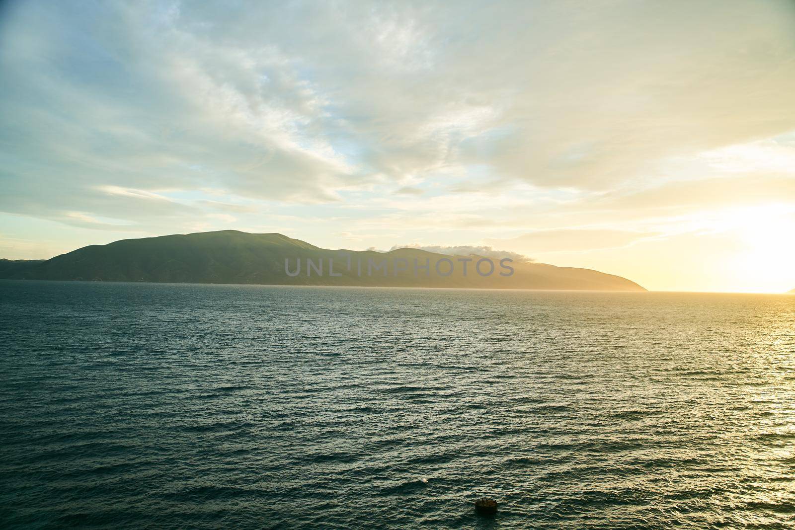 View of the Ionian Sea and sunset in Albania. High quality photo