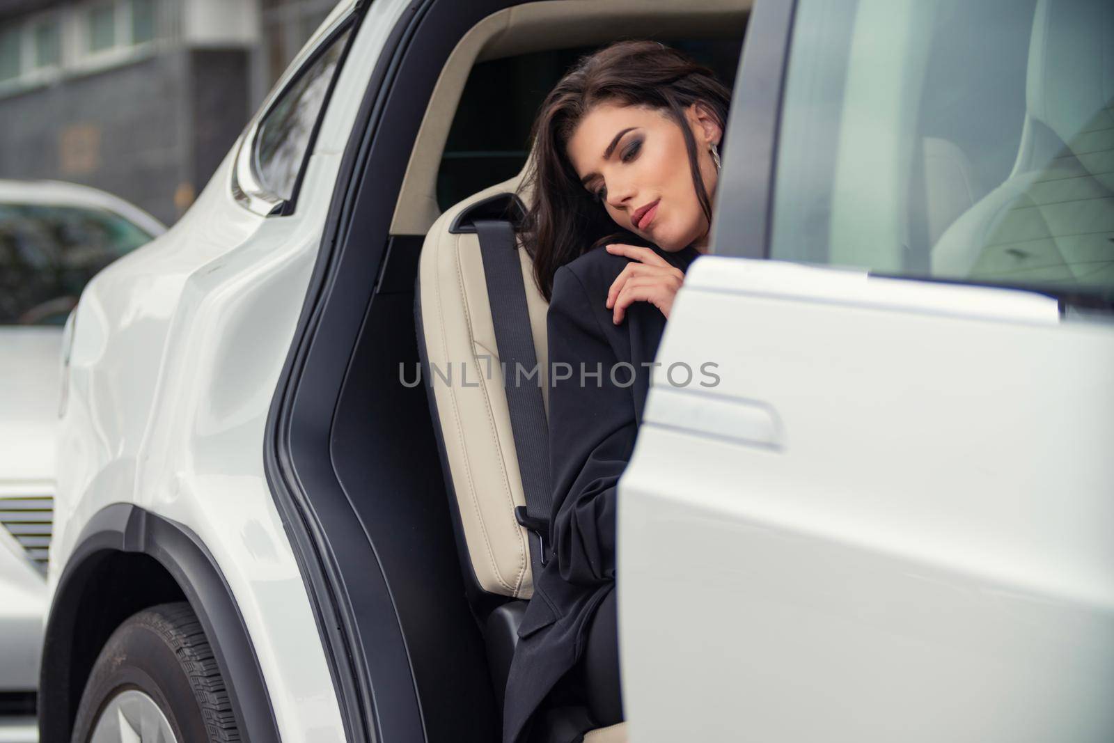 girl sitting in the back seat by zokov
