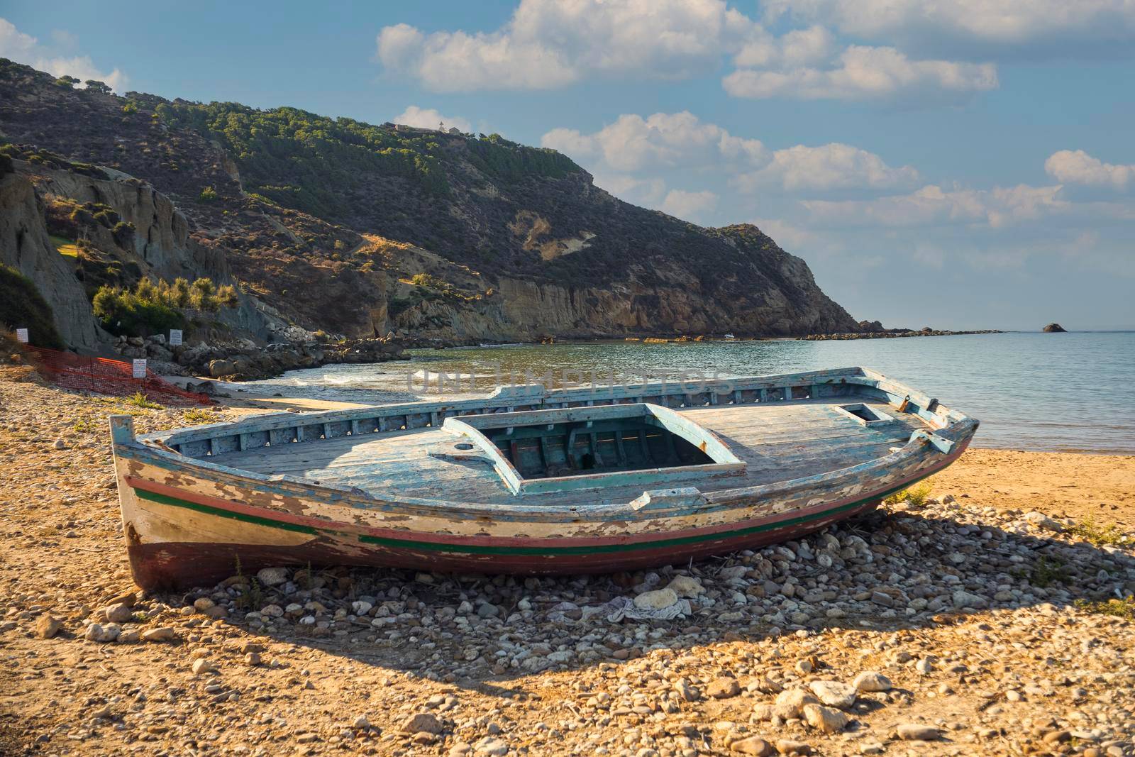 A Broken migrant boat stranded on the beach of the Agrigento coast