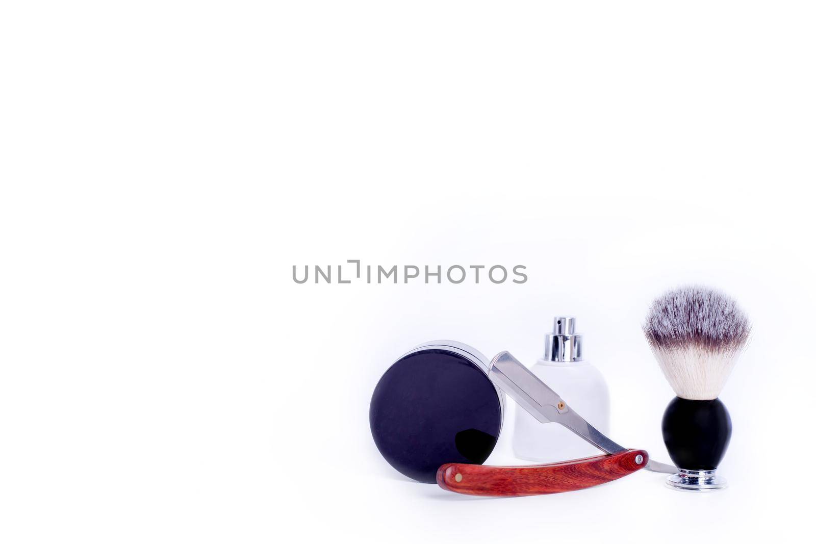 vintage razors, parfume and brush on a white background. Space for text by Iryna_Melnyk