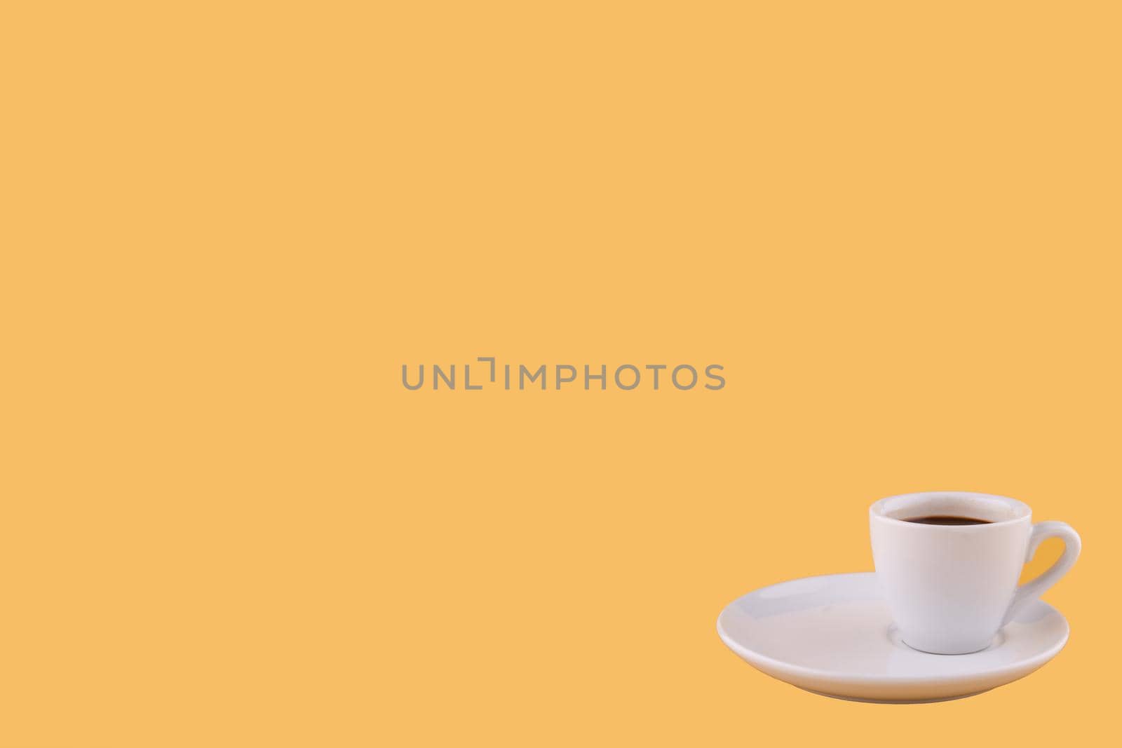 cup of espresso coffee on a yellow background. Space for text. by Iryna_Melnyk