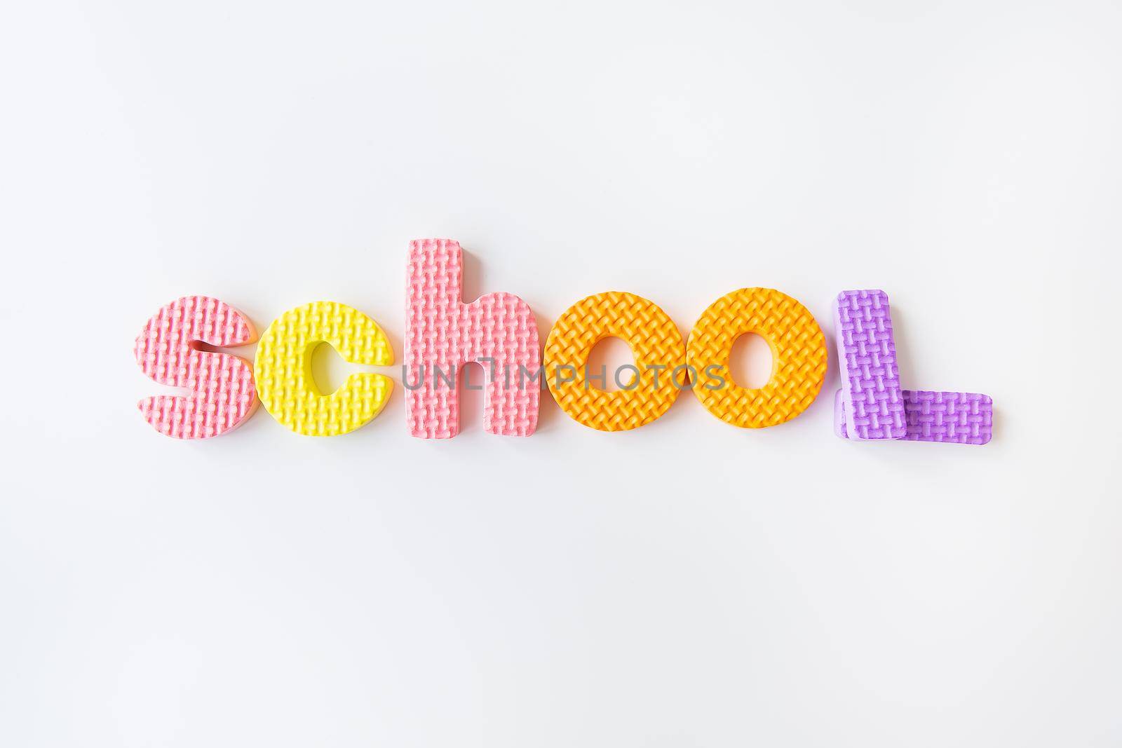 Multicolored letters. Letters for the study of children in kindergarten or school, fluted letters. School lettering