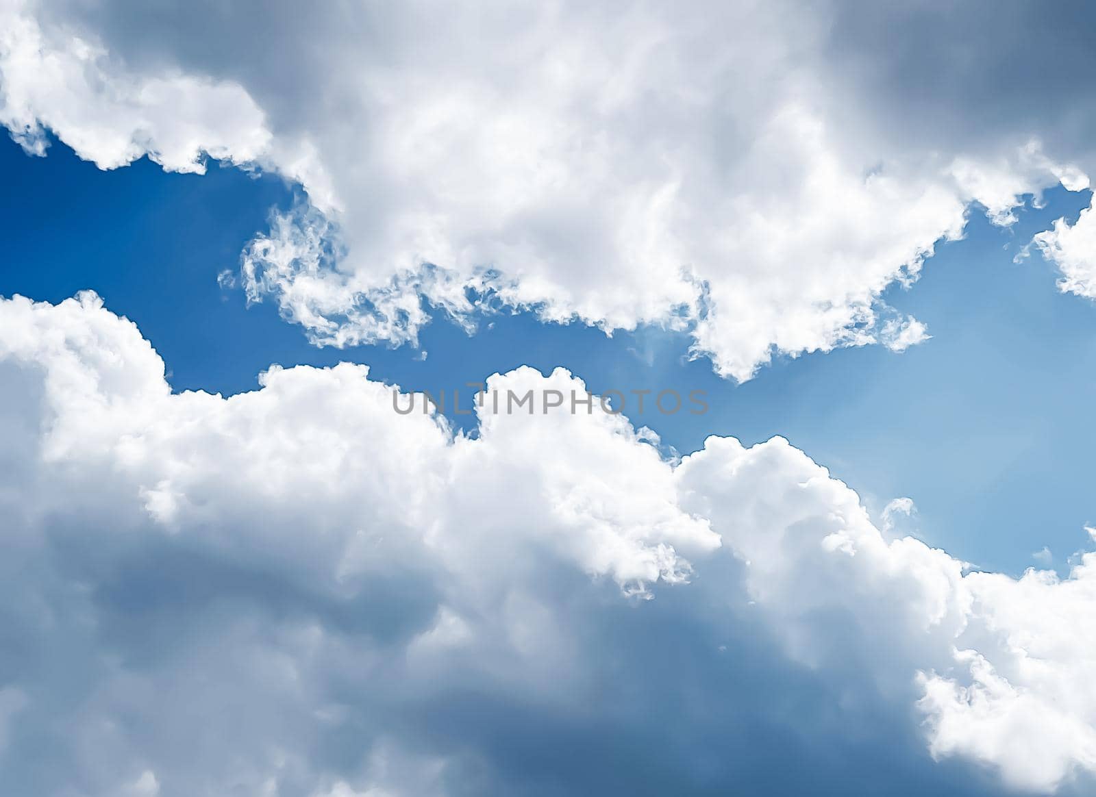 Sunny blue cloudy sky as abstract background, beauty in nature design concept