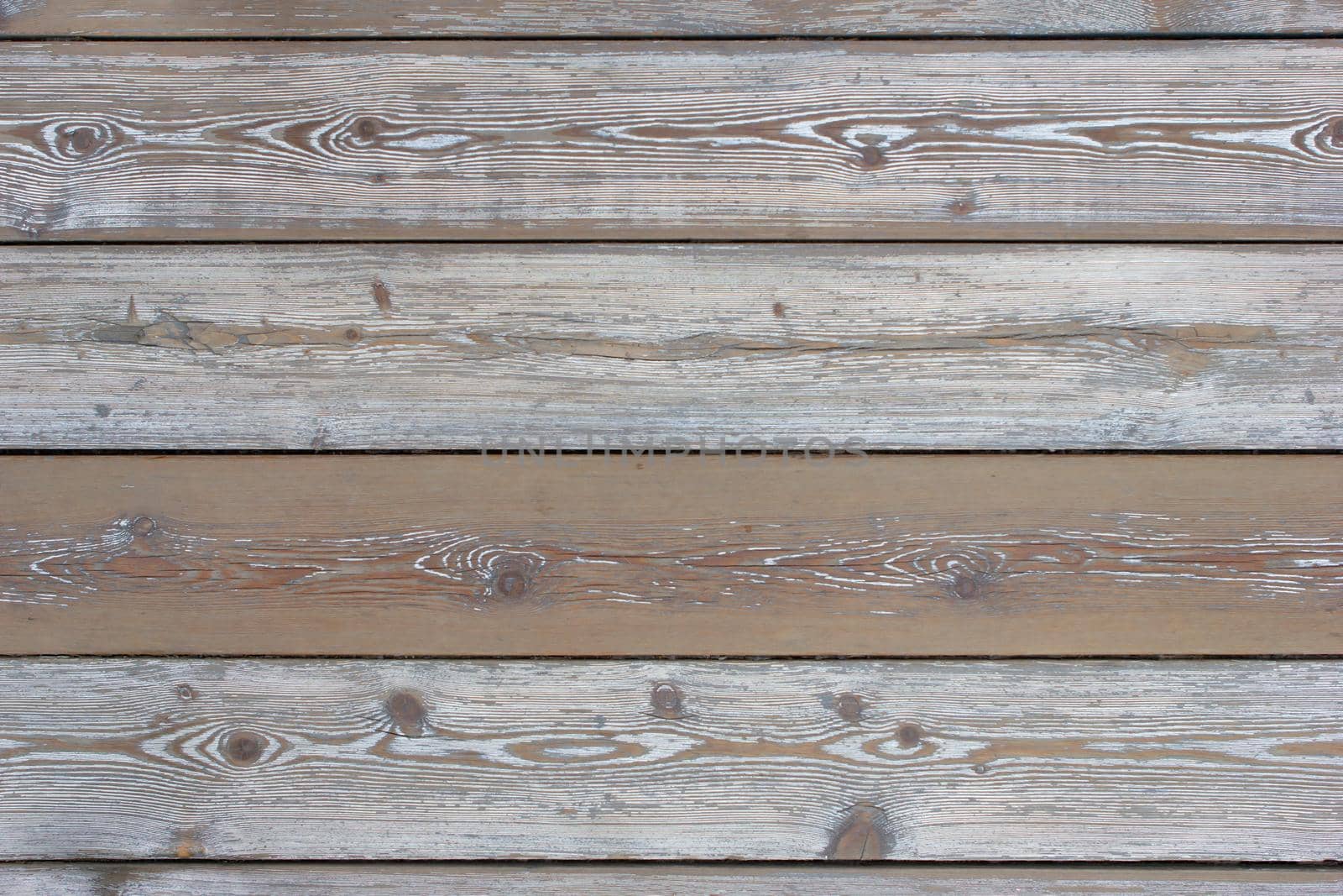 Wooden floor with beautiful texture. Texture of wooden boards, top view, close-up
