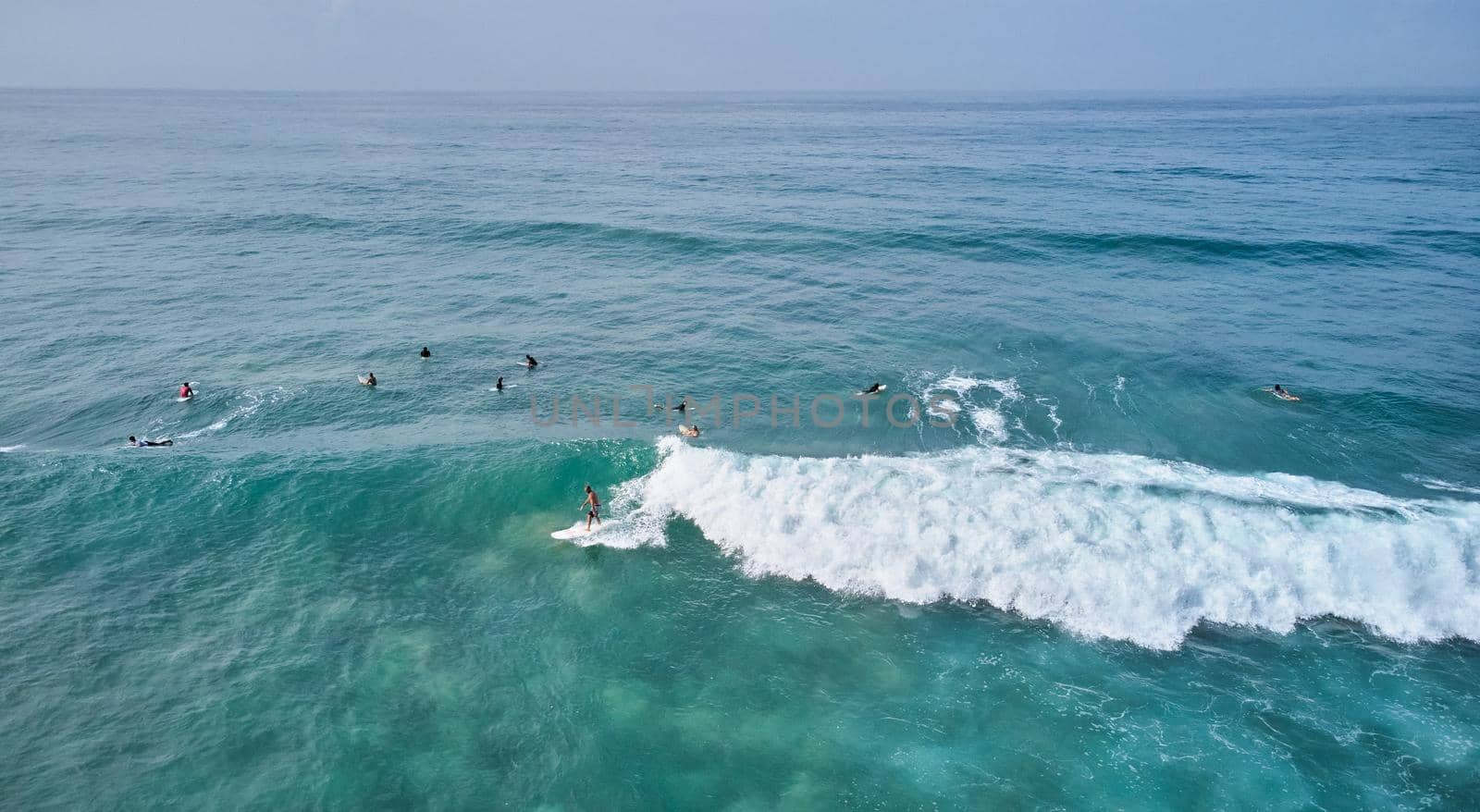 Aerial view of surfers waiting for the wave. Sri Lanka, Midigama by driver-s