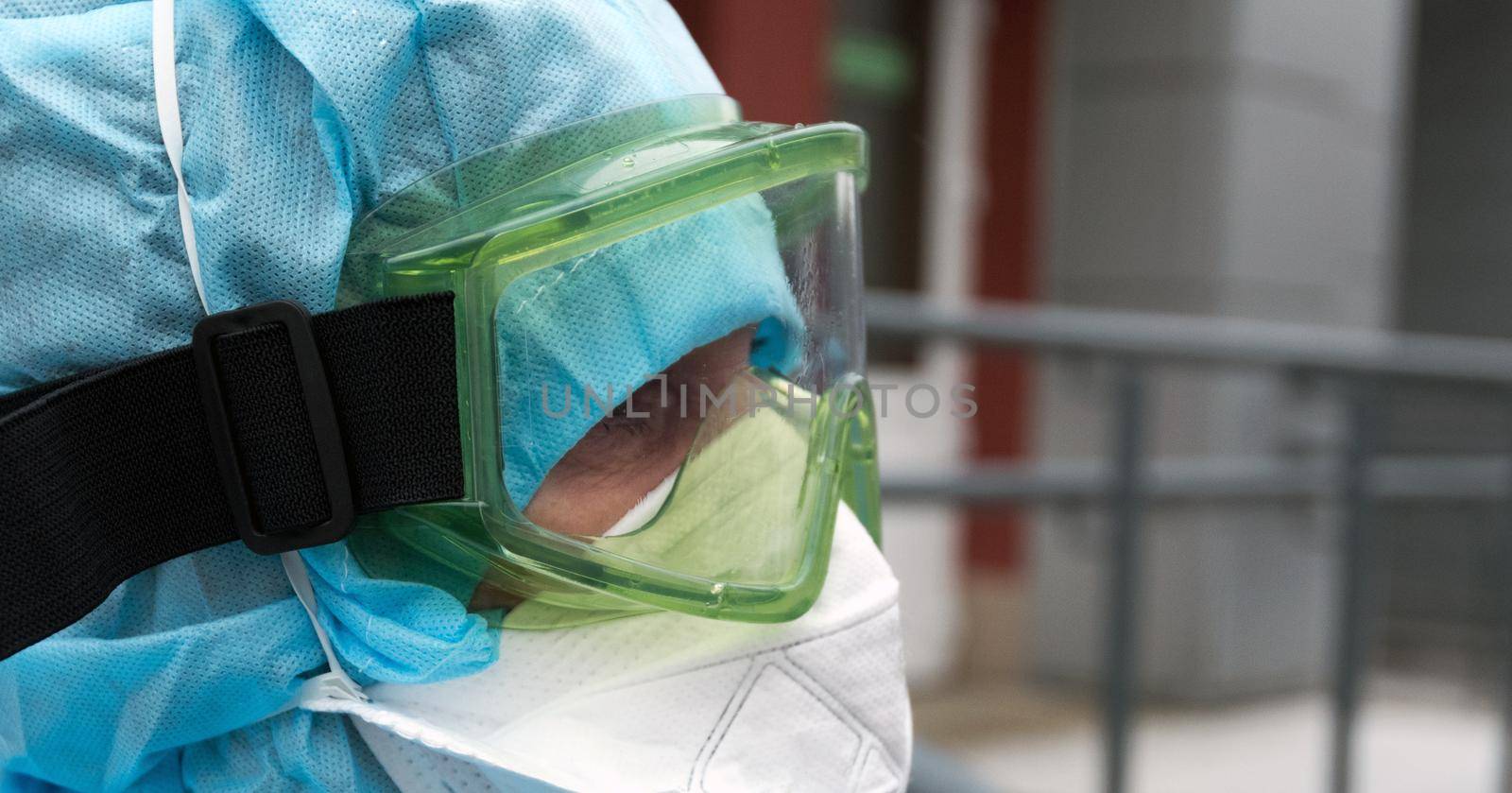 biohazard, virus, face in protective suit and gas mask