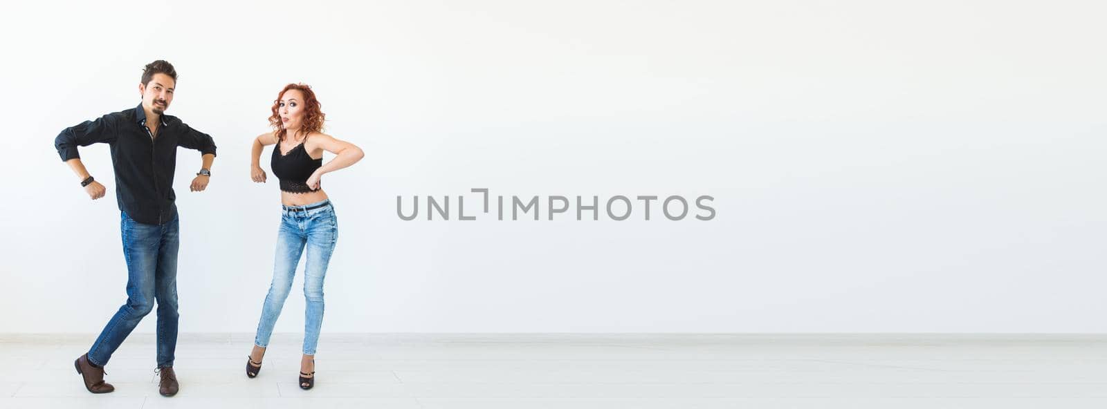 Banner social dance concept - Crazy dancing, cheerful couple over white background copy space and place for advertising by Satura86