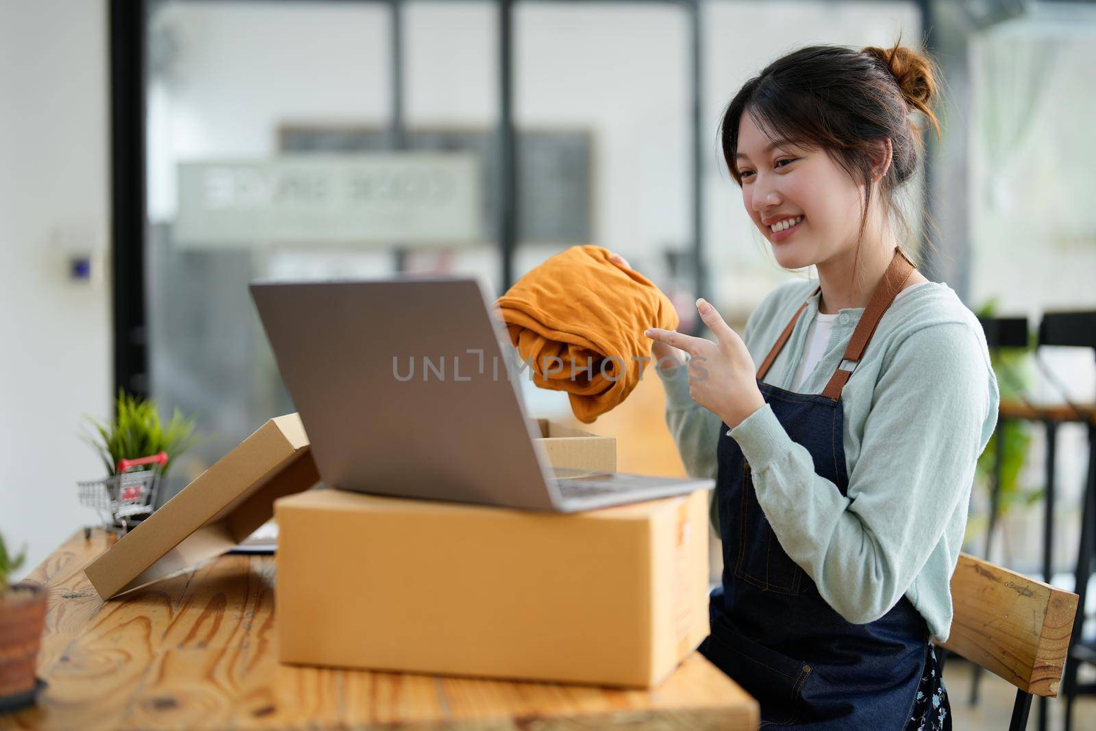 Portrait of young business asian woman online working in office desk use computer copyspace. Success business people employee, freelance SME online marketing work at home, coworking space concept.