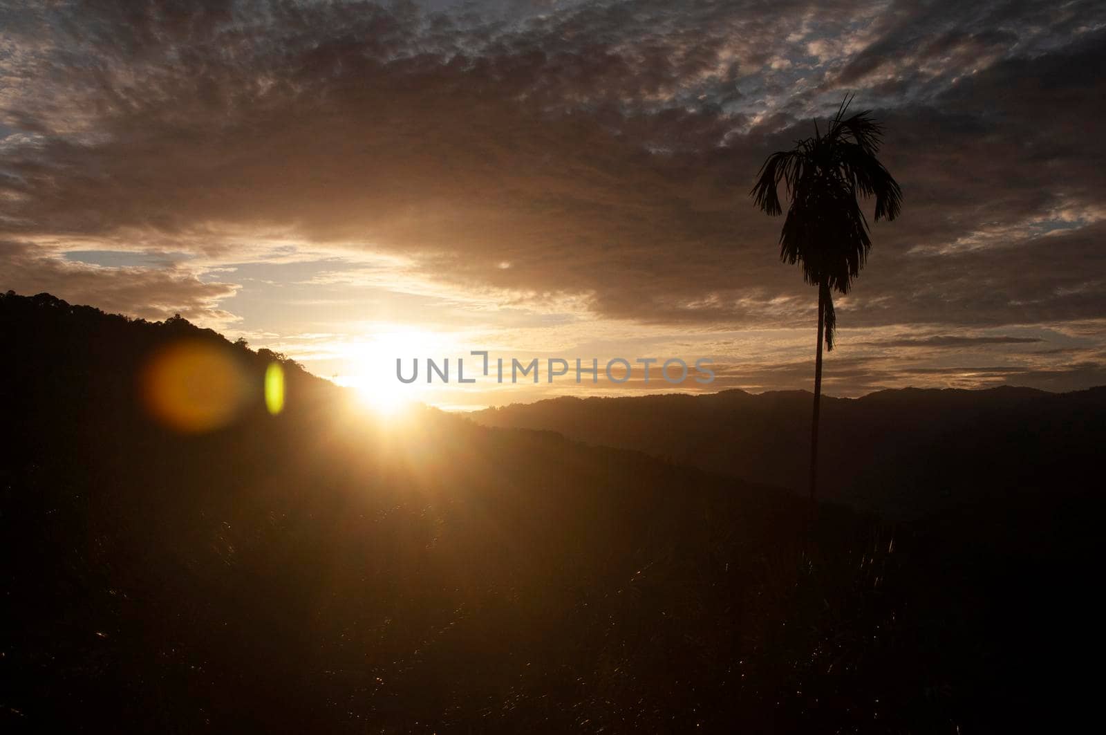 Sunset view with mountain and hill background. Nature beauty and copy space.