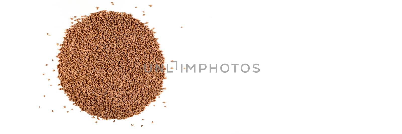 Texture of buckwheat. Background for dry buckwheat design. Large size for banner printing or packaging. Top view of evenly scattered buckwheat groats