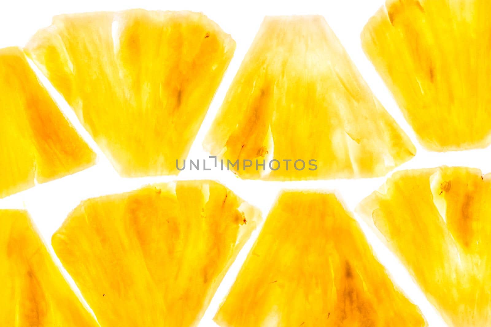 Pineapple chunks isolated on white background. Slices. Slose-up. Copy space