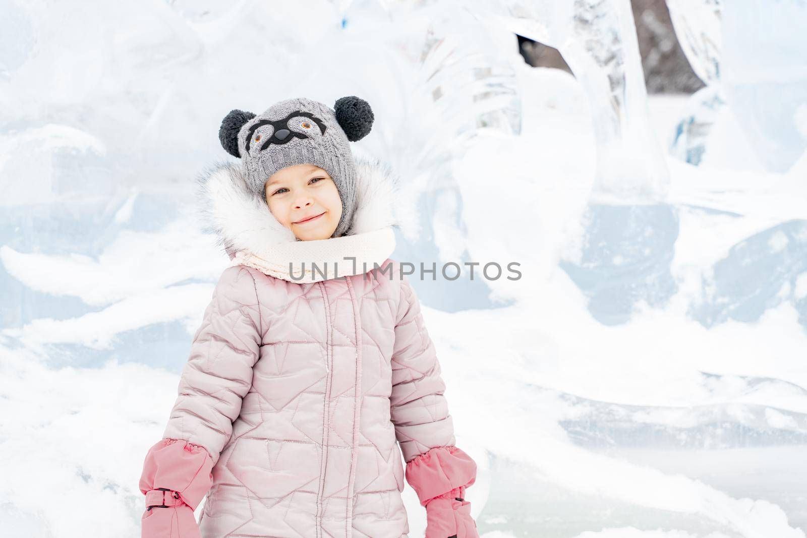 cute little caucasian girl with ice sculptures by Lena_Ogurtsova