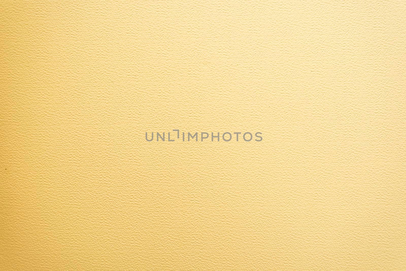 A light yellow wall texture abstract background.