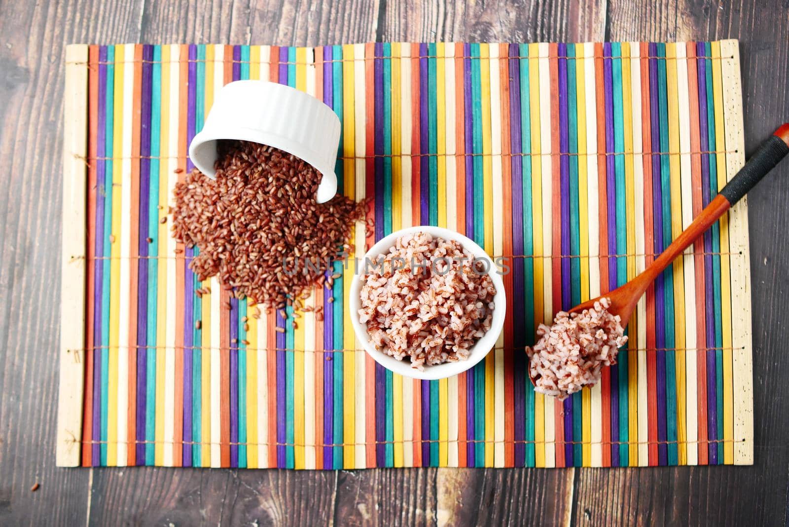 red rice in a bowl on table , haradighi rice .
